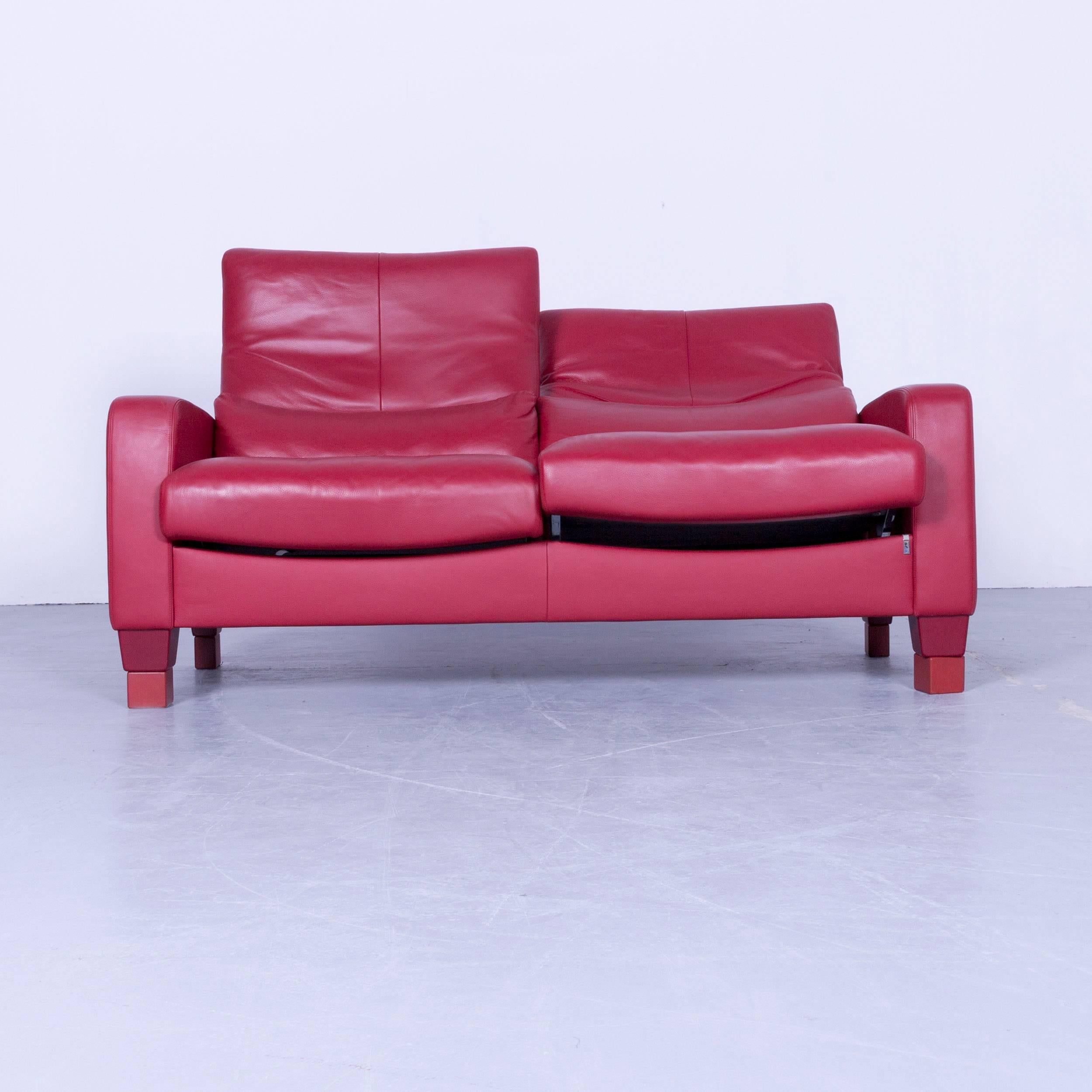 Erpo designer sofa set leather red two-seat and armchair, in a minimalistic and modern design, with convenient functions, made for pure comfort.