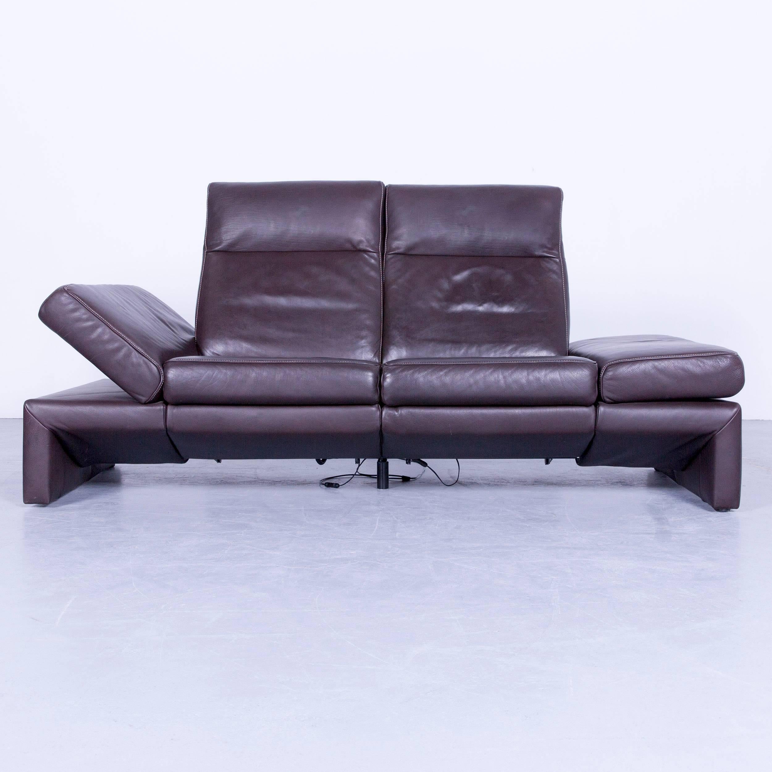 Original Mondo designer sofa brown three-seat couch modern electric recliner function, in a minimalistic design, with convenient functions, made for pure comfort and flexibility.