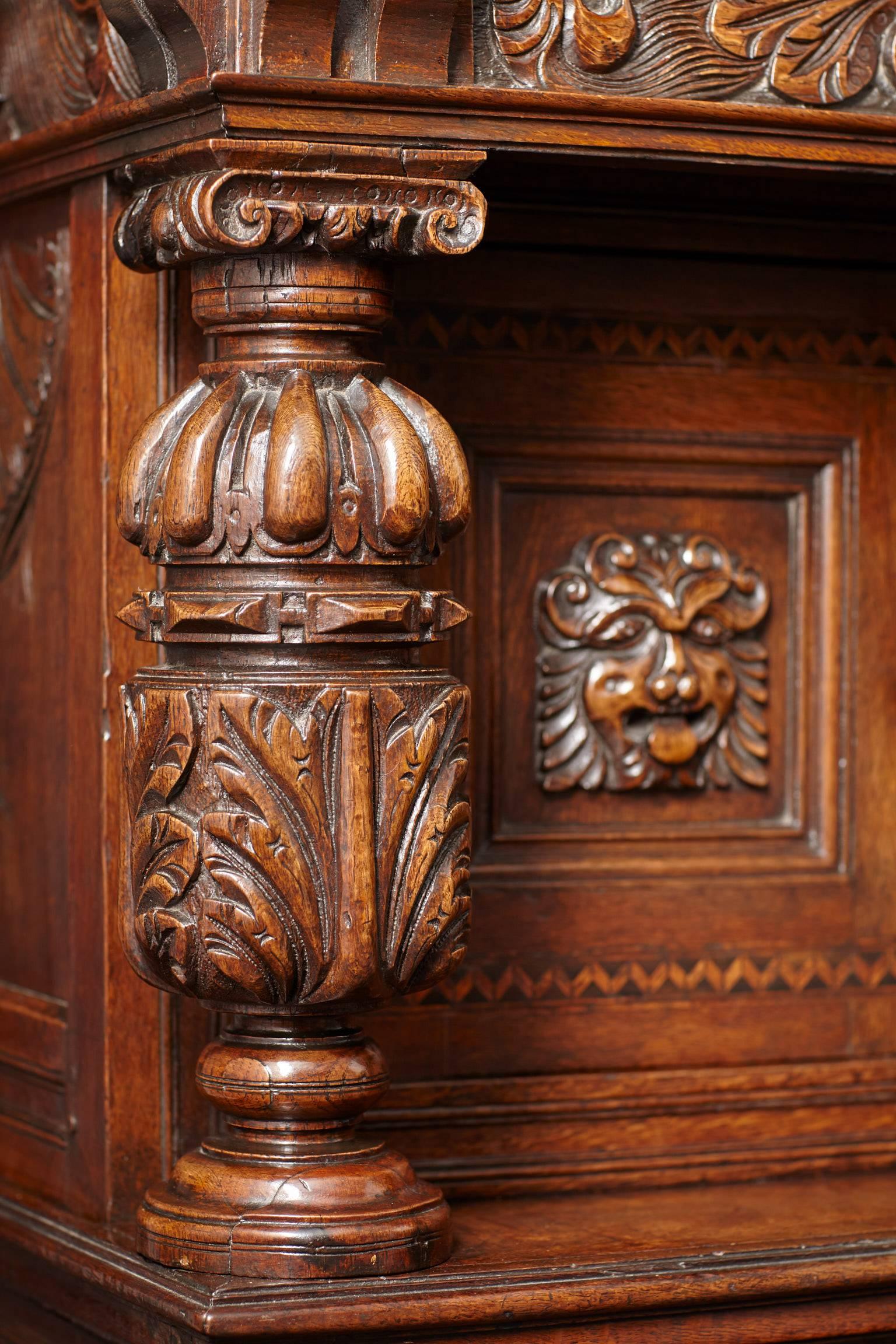 Carved Elizabethan Oak and Inlaid Court Cupboard For Sale
