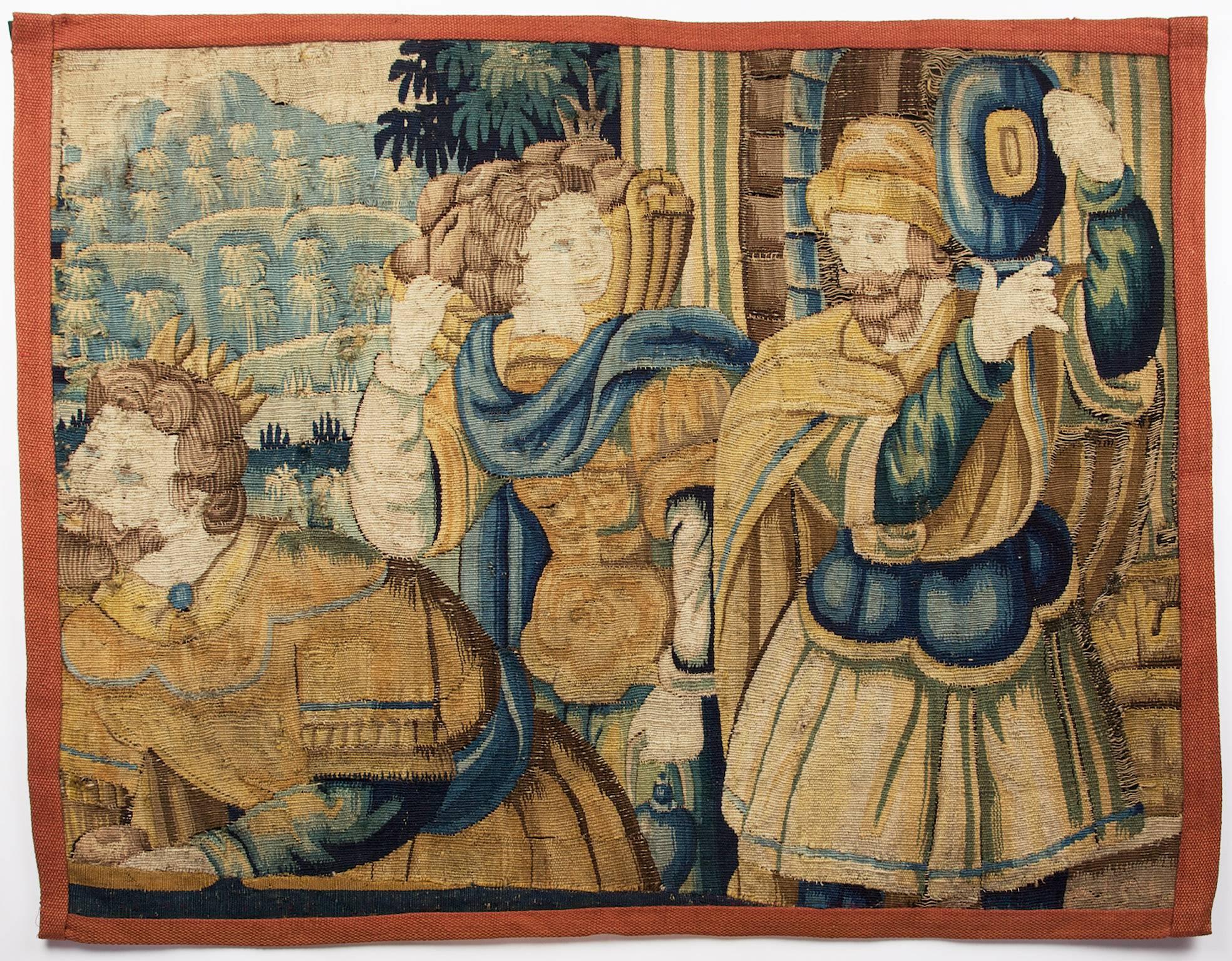 Section of late 16th century tapestry, Brussels, Belgium.

Tapestry featuring three figures, carrying gifts of fruit, an urn and one figure crowned. The scene removed from a larger original Tapestry, with modern border.

From the collection of