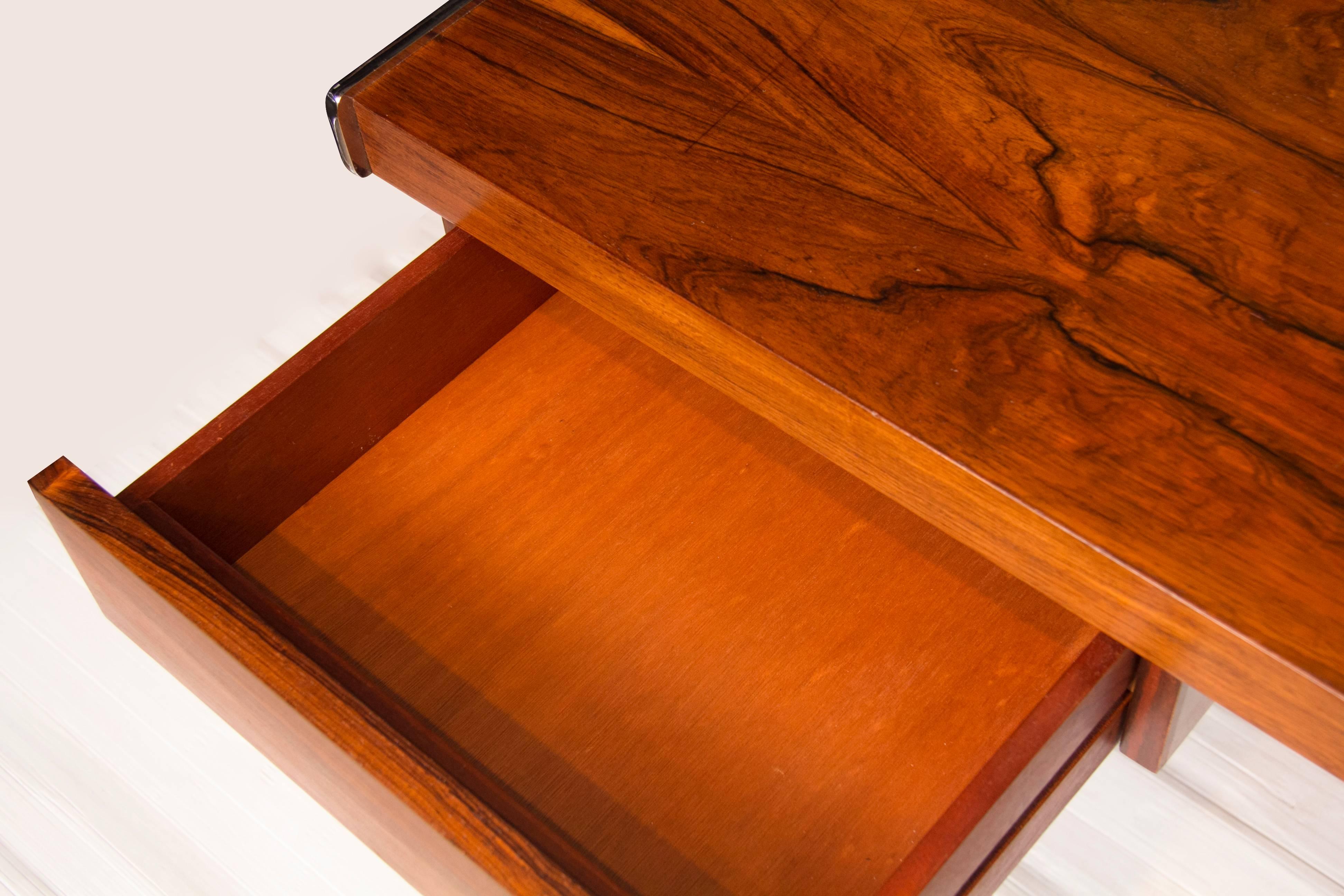 Marrow associates rosewood desk with single drawer standing on a chrome base, designed in the 1970s by David Folker.