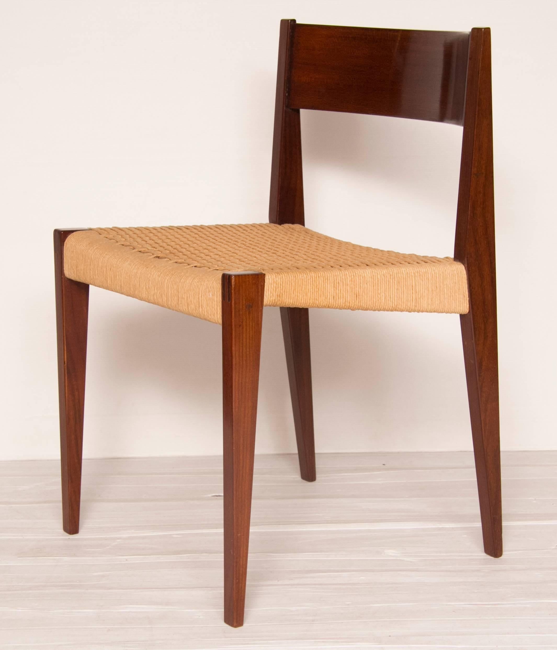 Set of four Pia dining chairs.