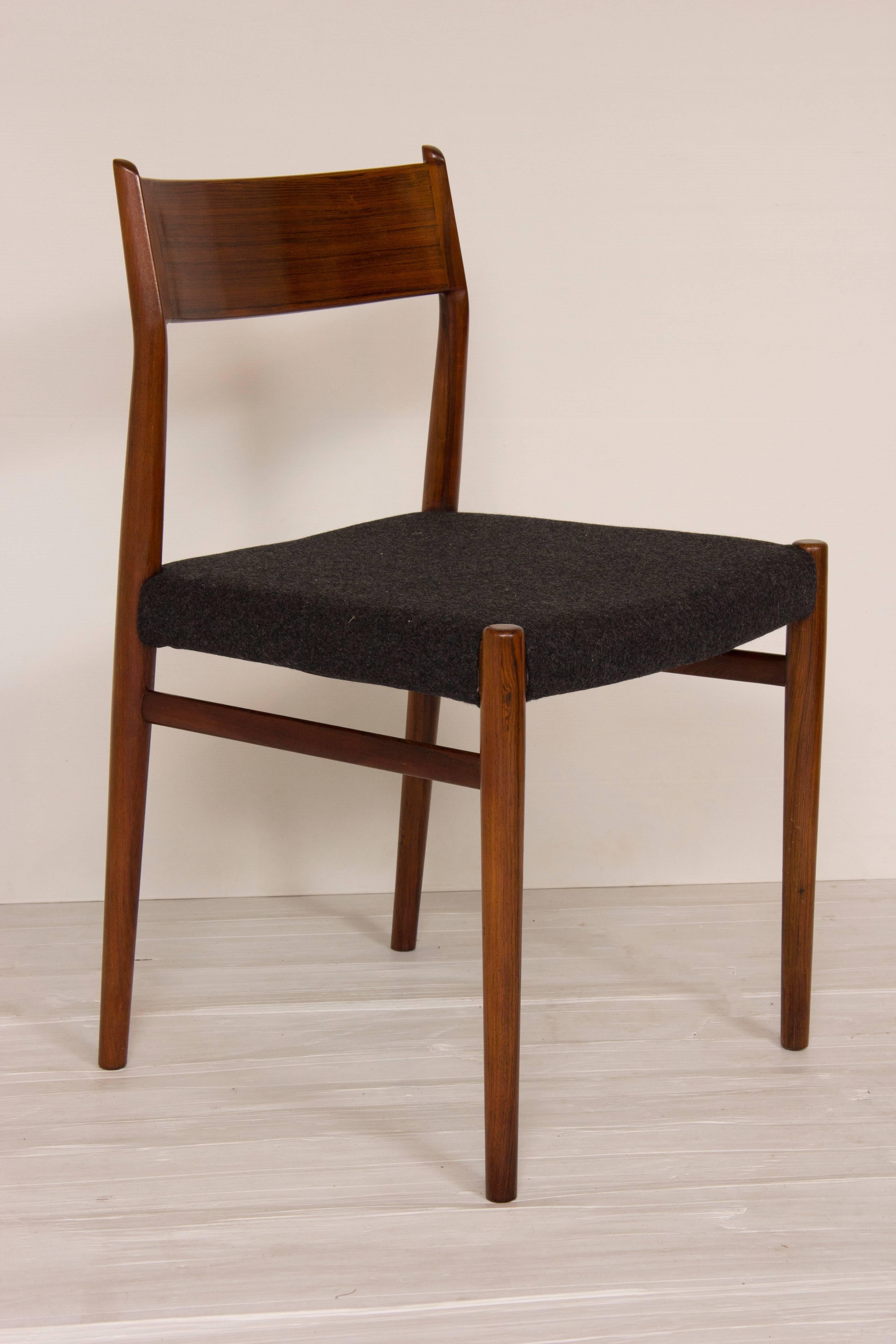 Set of ten Arne Vodder rosewood dining chairs. Model number 418. Upholstered in charcoal grey wool fabric.