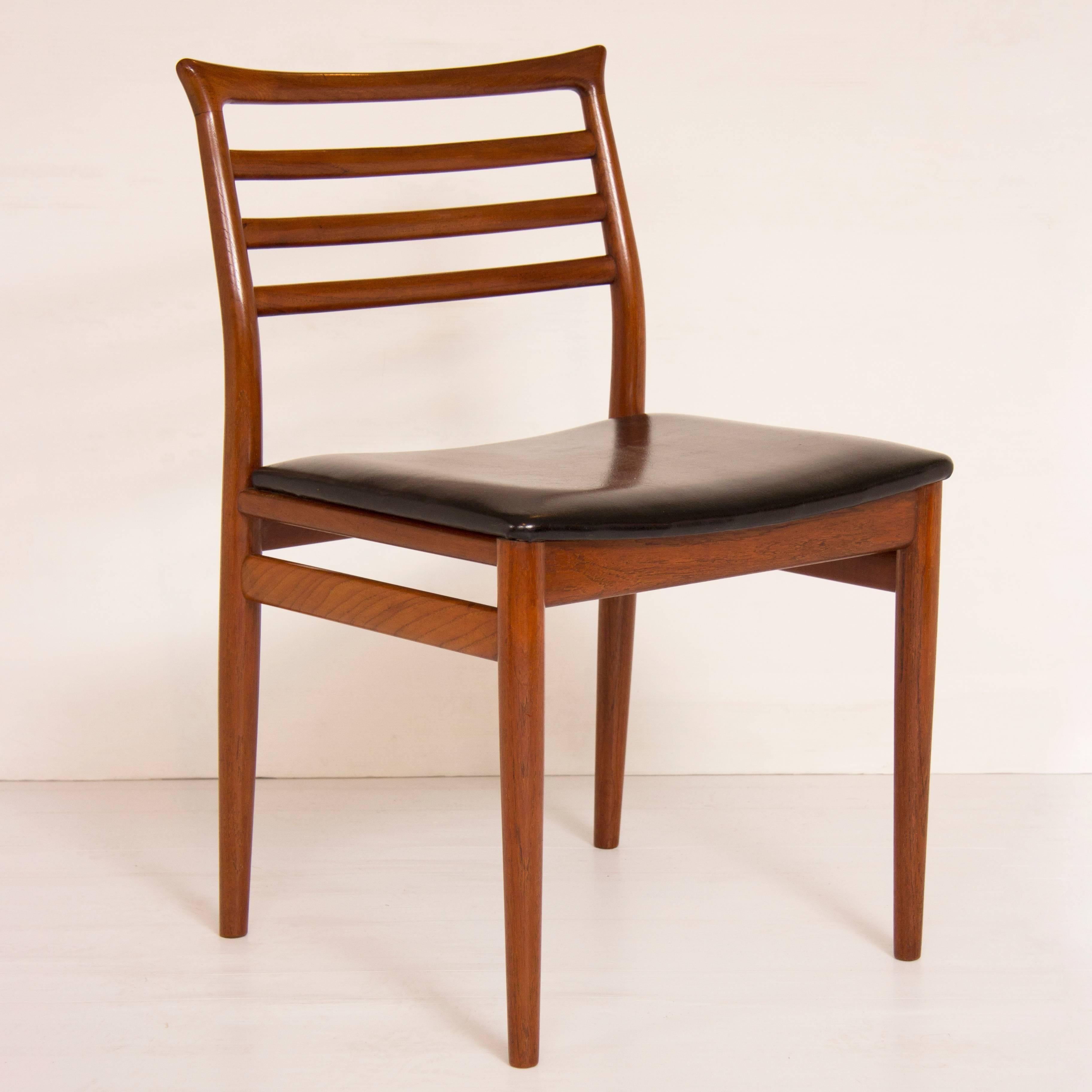 Set of six Erling Torvits teak dining chairs.