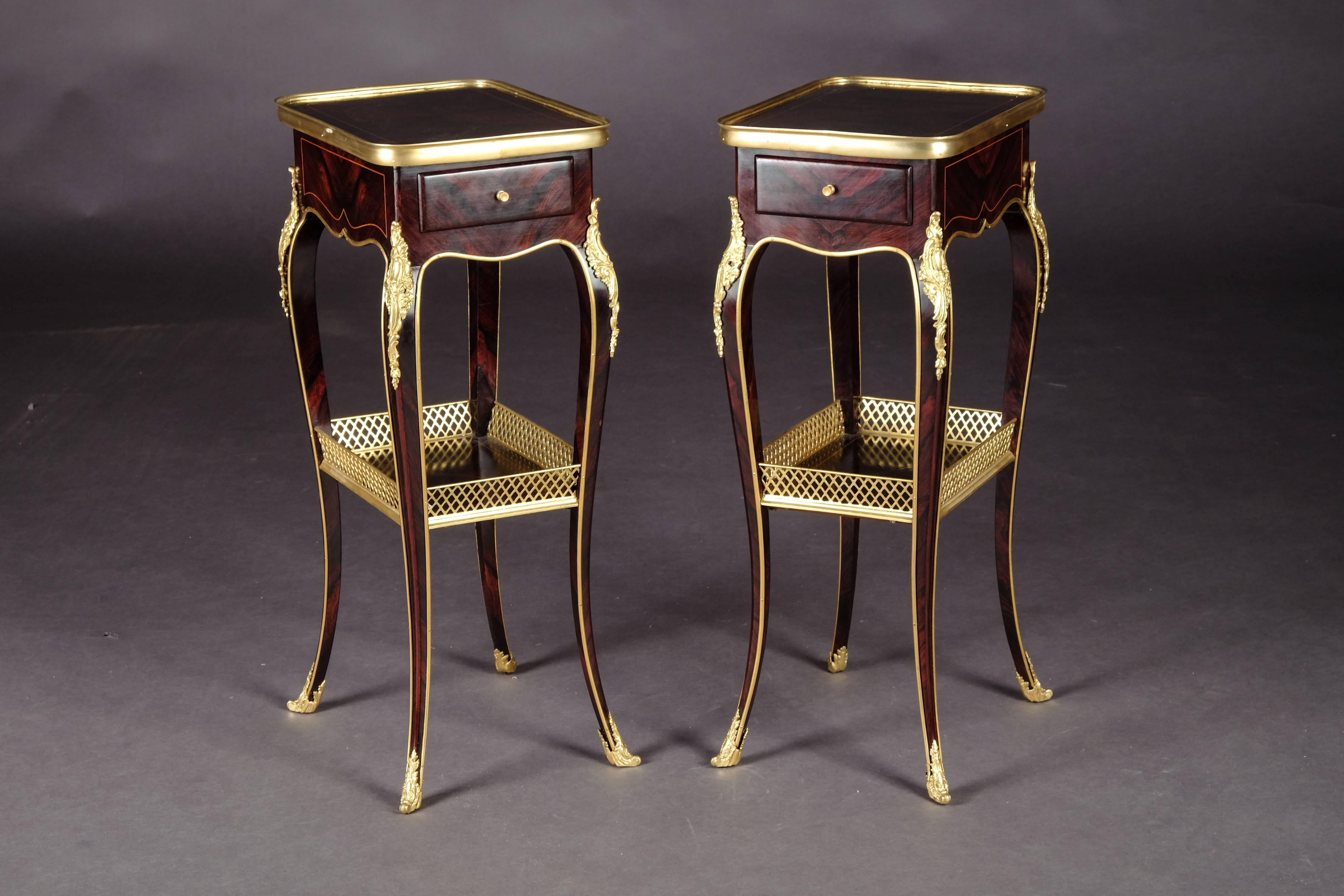 Polished Palisander on solid beech wood. Very fine, floral, bronze fittings. Embracing frame box on high slightly curved legs with intermediate tray connected in sabots. Slightly protruding top plate in brass frame. Beautiful patina, with shellac