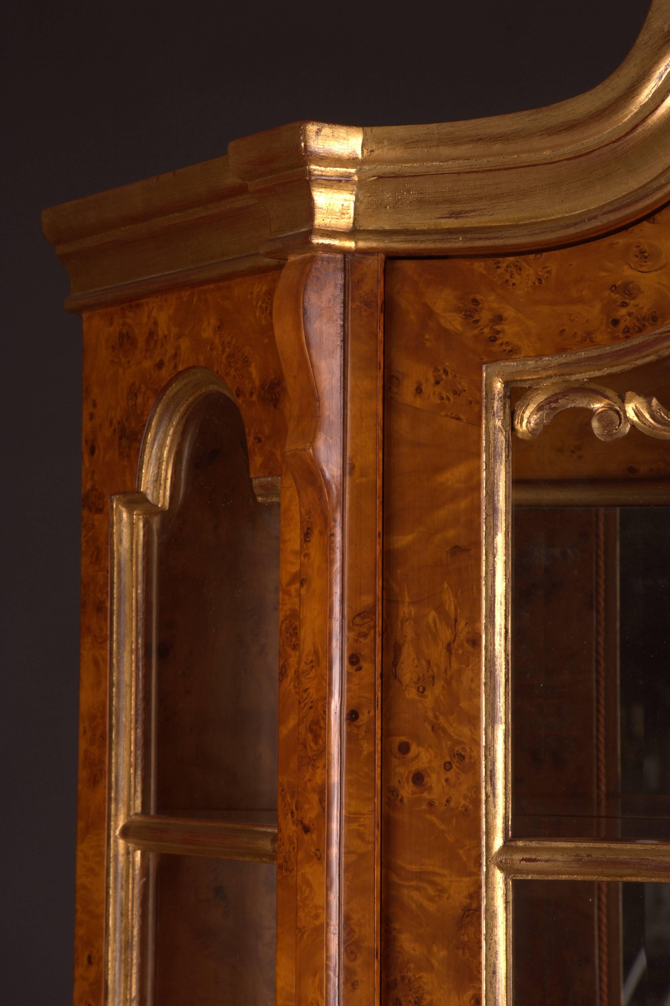 Maple root veneer on solid beech and pine woods. Gilded. Strongly bowed, rofile- framed, one drawered border. Pedestal on strongly claw-feet.