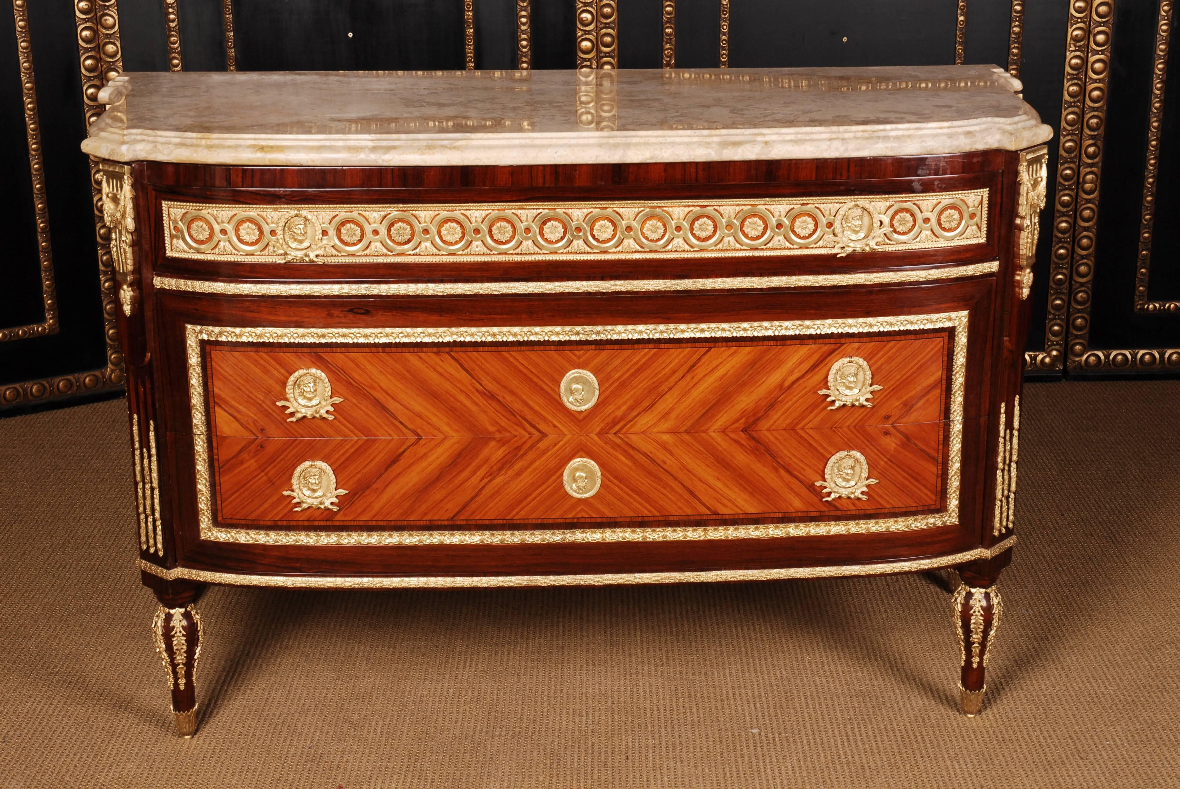 Lightly modified commode model after the original in the Chateau
Versaille commode of Jean Francois Leleu (1729-1807).
Various rosewoods on solid pinewood.
heavy Marble Top 
 