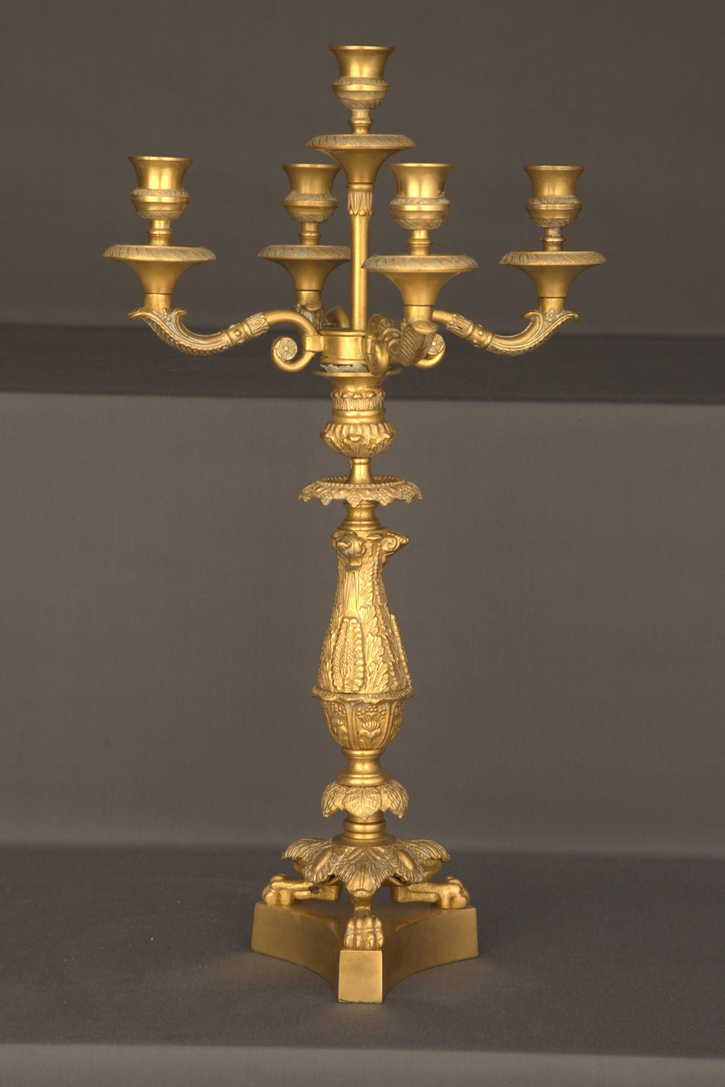 Bronze, finely engraved. Column-shaft as holder for four Sweeping
candelabra arms. Diameter: 30 cm, height: 52 cm.