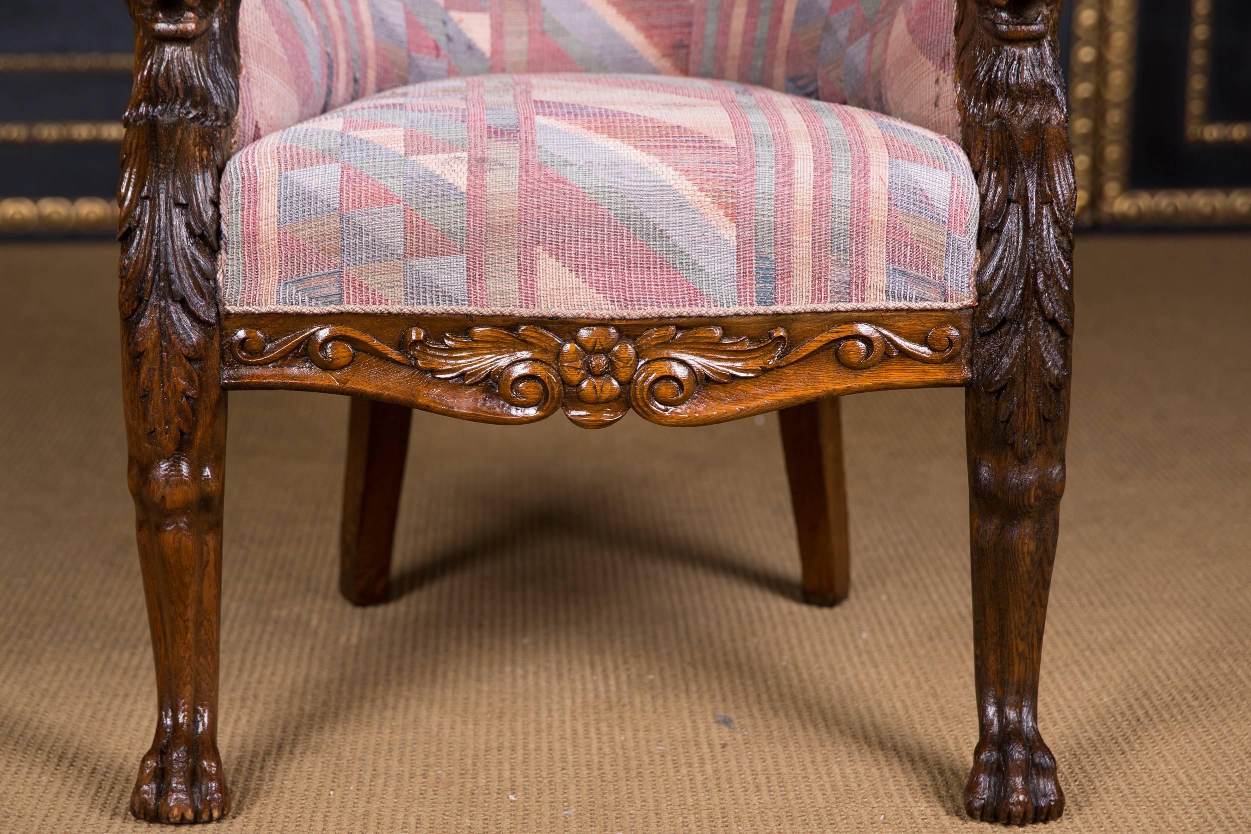 antique chair with lion heads