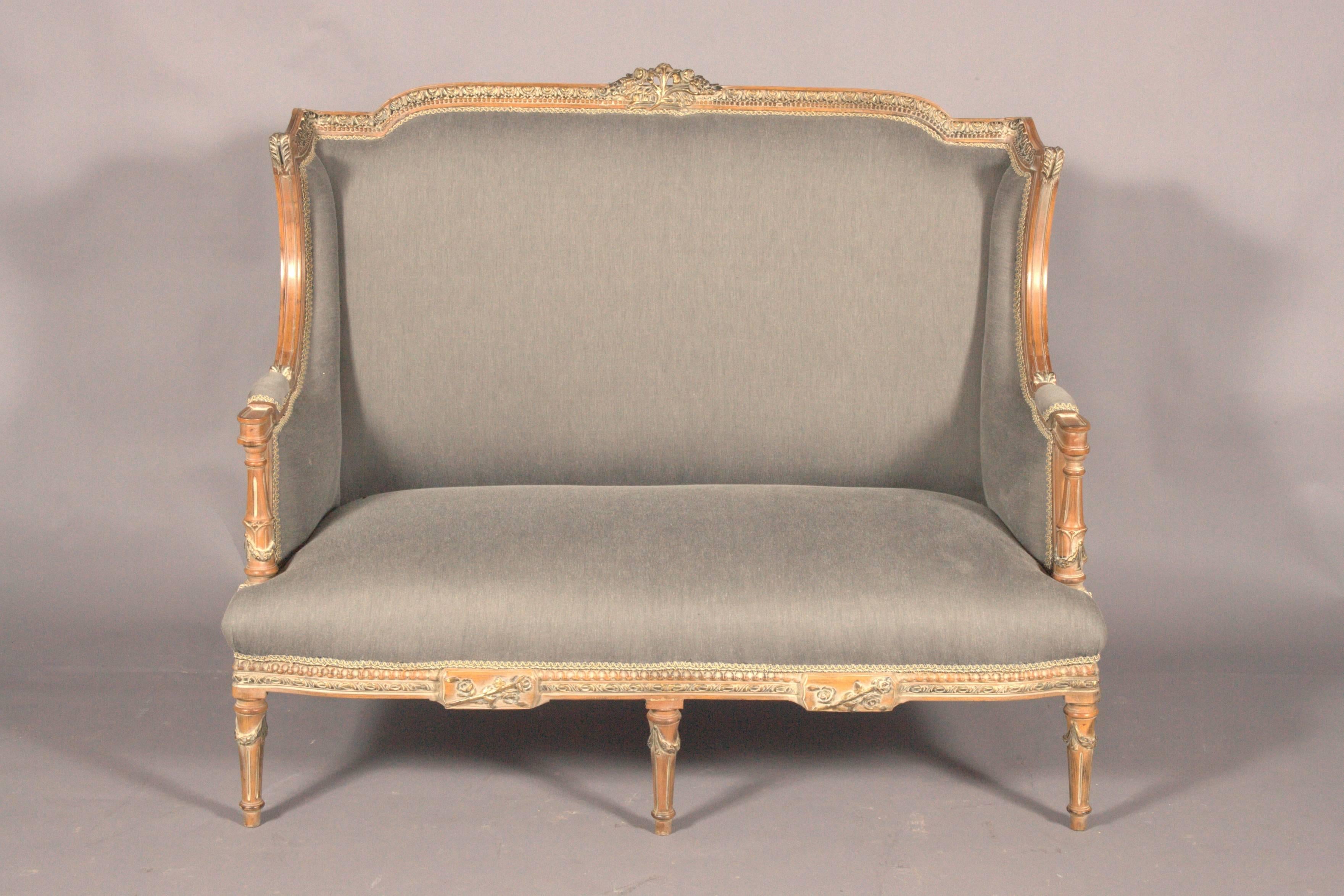 Etruscan decor, English influence evident. Solid beechwood, carved and framed.
Slightly scalloped frame on meshed legs.

Bevelled, carved, slightly ascending armrests. Braided backrest frame with beaded crown. The seat and backrest are finished with