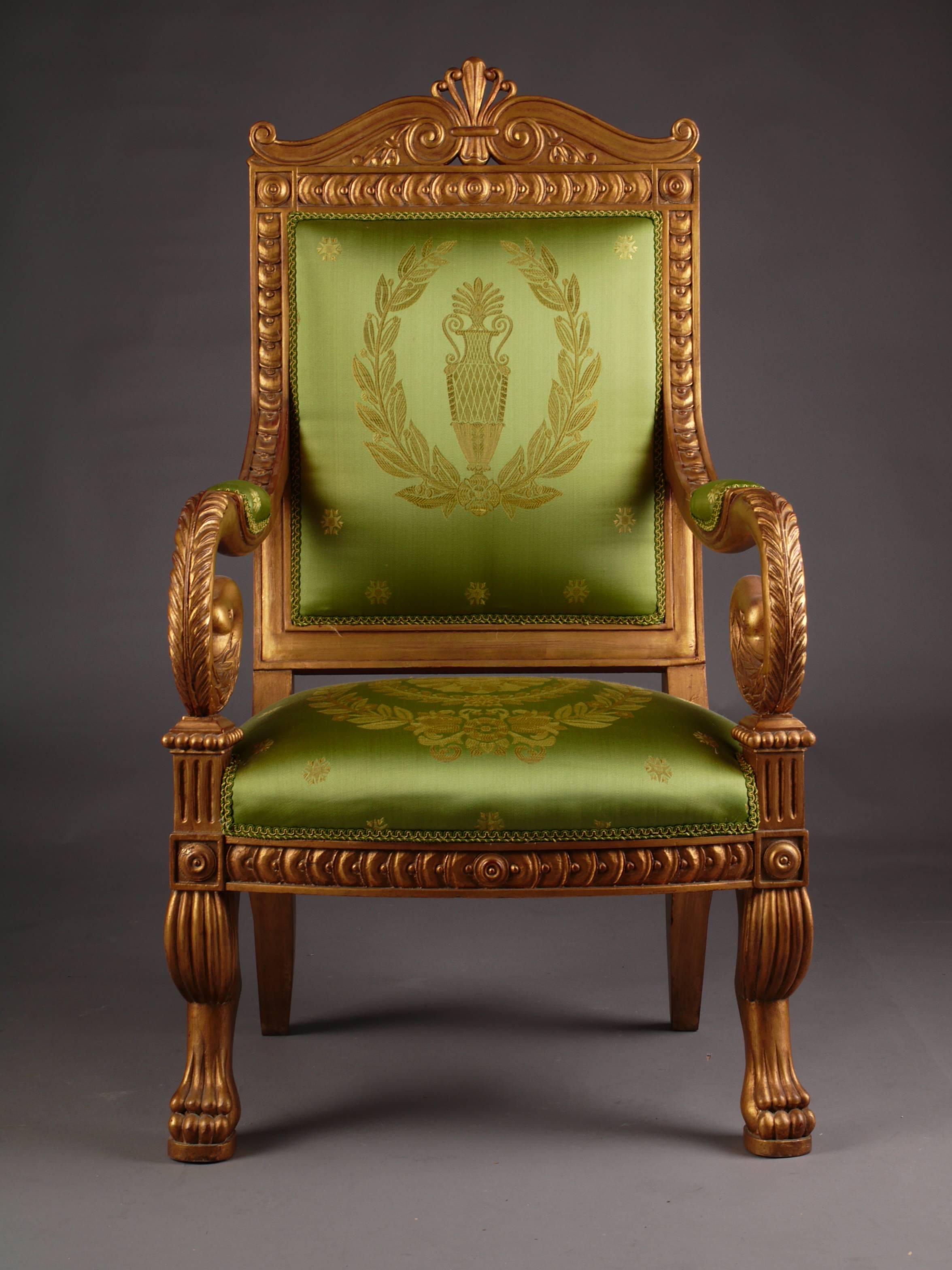 Very exact fine-carved sculpture made of solid beech. Poliment gilded. Arranged frame on plastically carved legs ending in claws. Armrests volute-shaped bent in swan head. High-backed backrest frame crowned with classical volute cornices with