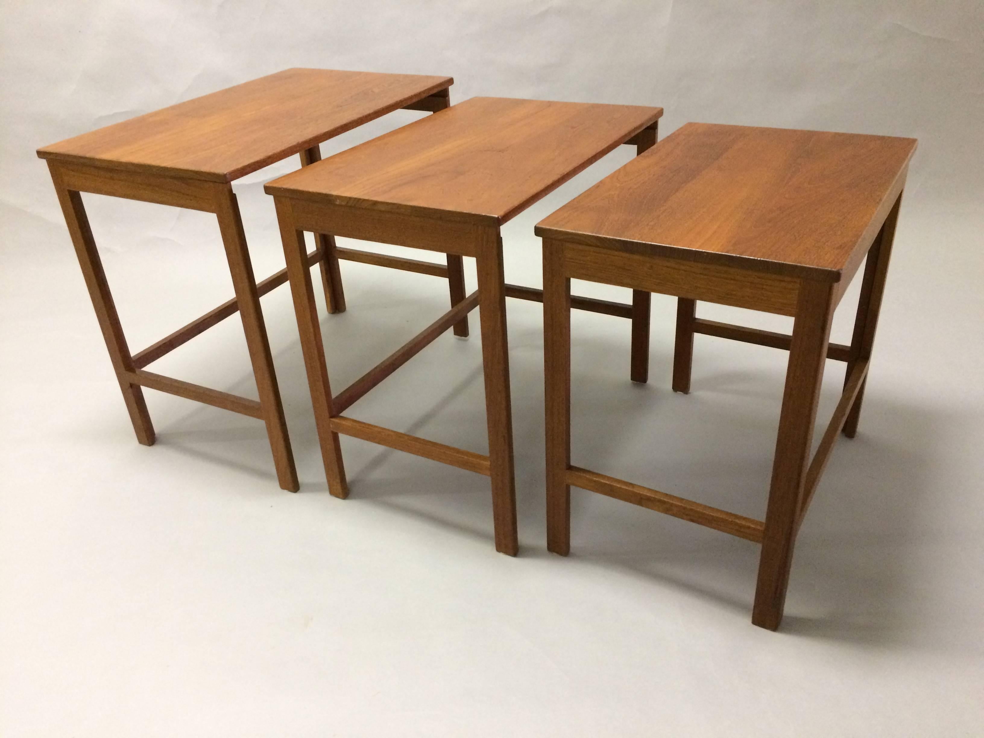 Classic set of nesting tables designed by Peter Hvidt & Orla Mølgaard Nielsen for France & Son, made of solid teak.

Seizes in cm/inch:
Large table - D: 37.5/14.8 W: 60/23.6 H: 54/21.3
Medium table - D: 36/14.2 W: 57/22.4 H: 52/20.5
Small table - D:
