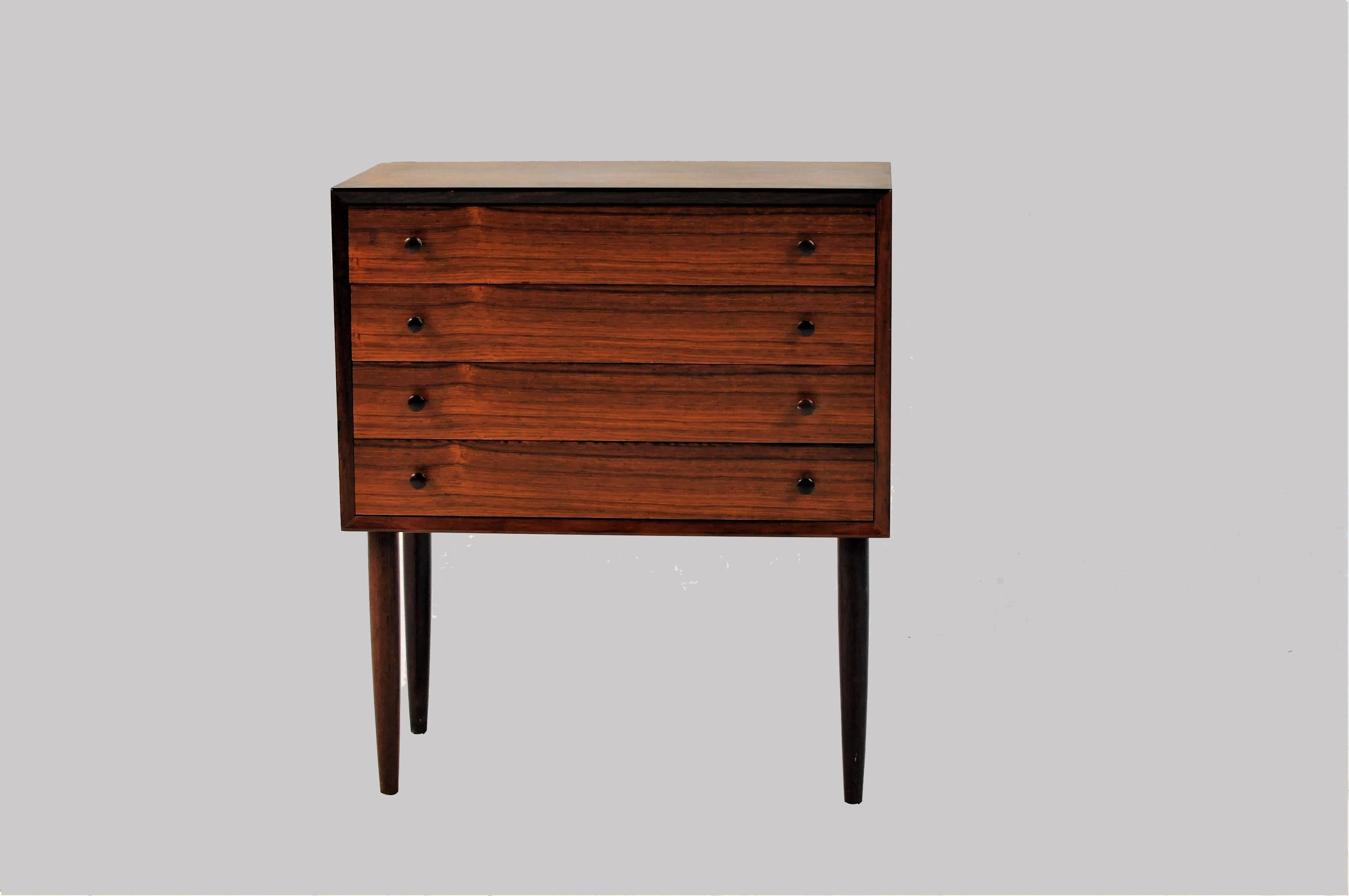 Danish chest of drawers in rosewood produced by Svend E. Jensens møbelfabrik in Aarhus, Denmark in the 1960s. The chest of drawers is restored and in good condition.

