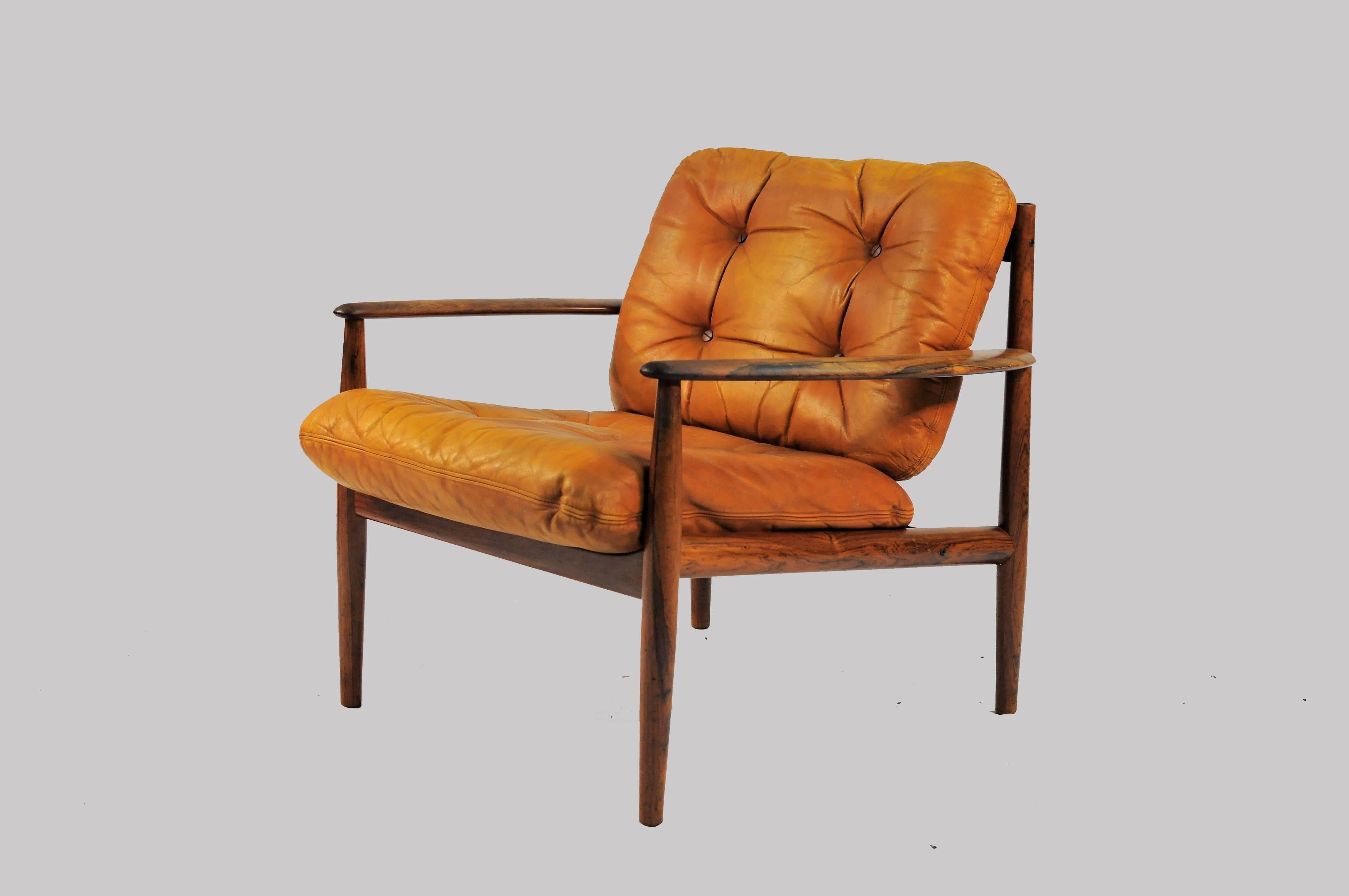 Two 1960s Grete Jalk lounge chairs in rosewood and original brown leather cushions produced by France & Søn.

The frames of the chairs have been overlooked and refinished by our cabinetmaker and are in very good condition. The  original leather