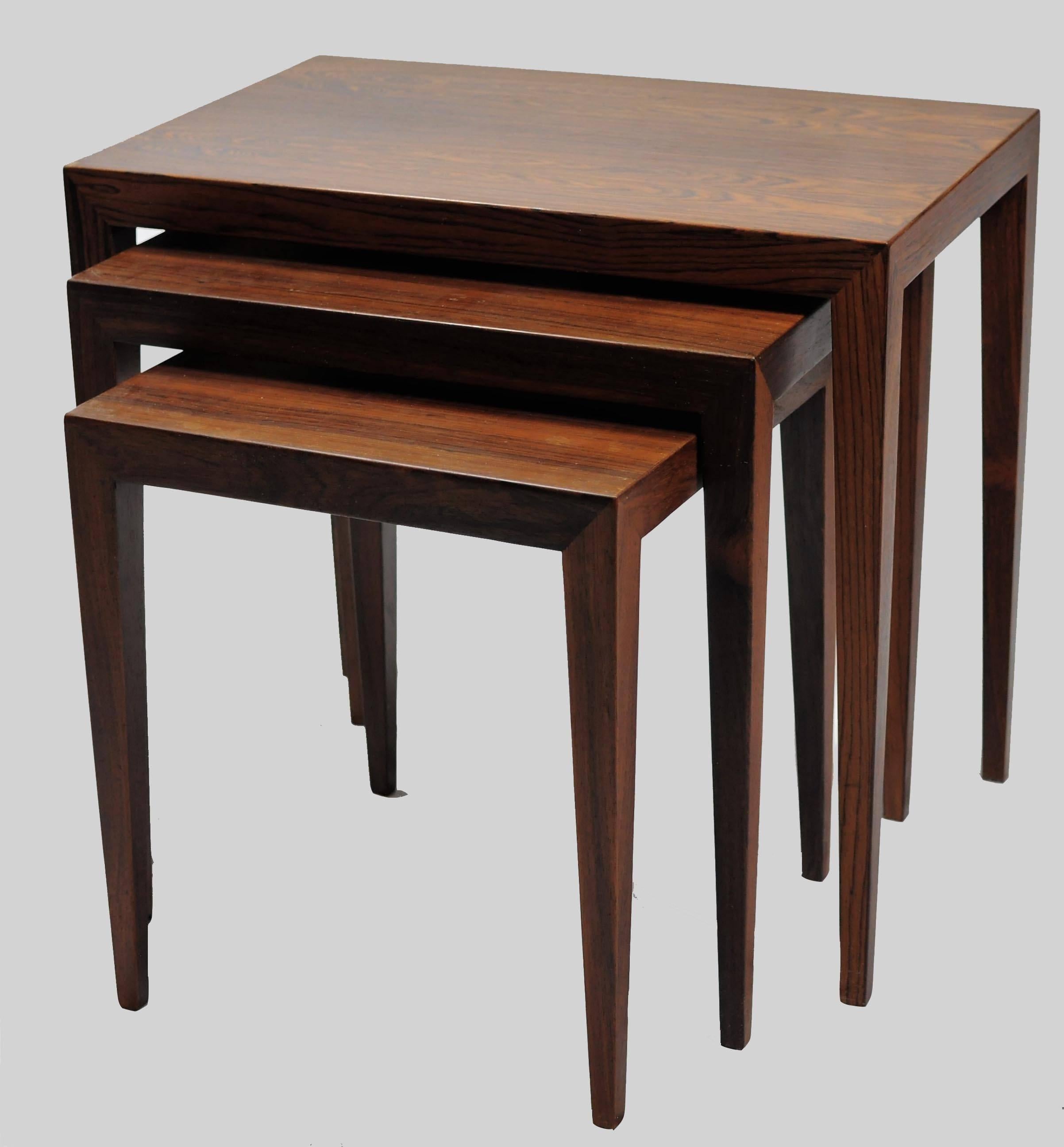Set of three nesting tables in rosewood designed by Severin Hansen Jr for Haslev Møbelfabrik.

Danish furniture designer Severin Hansen Jr. is best remembered for his table and desk designs in the classic, Danish midcentury modern style. In the