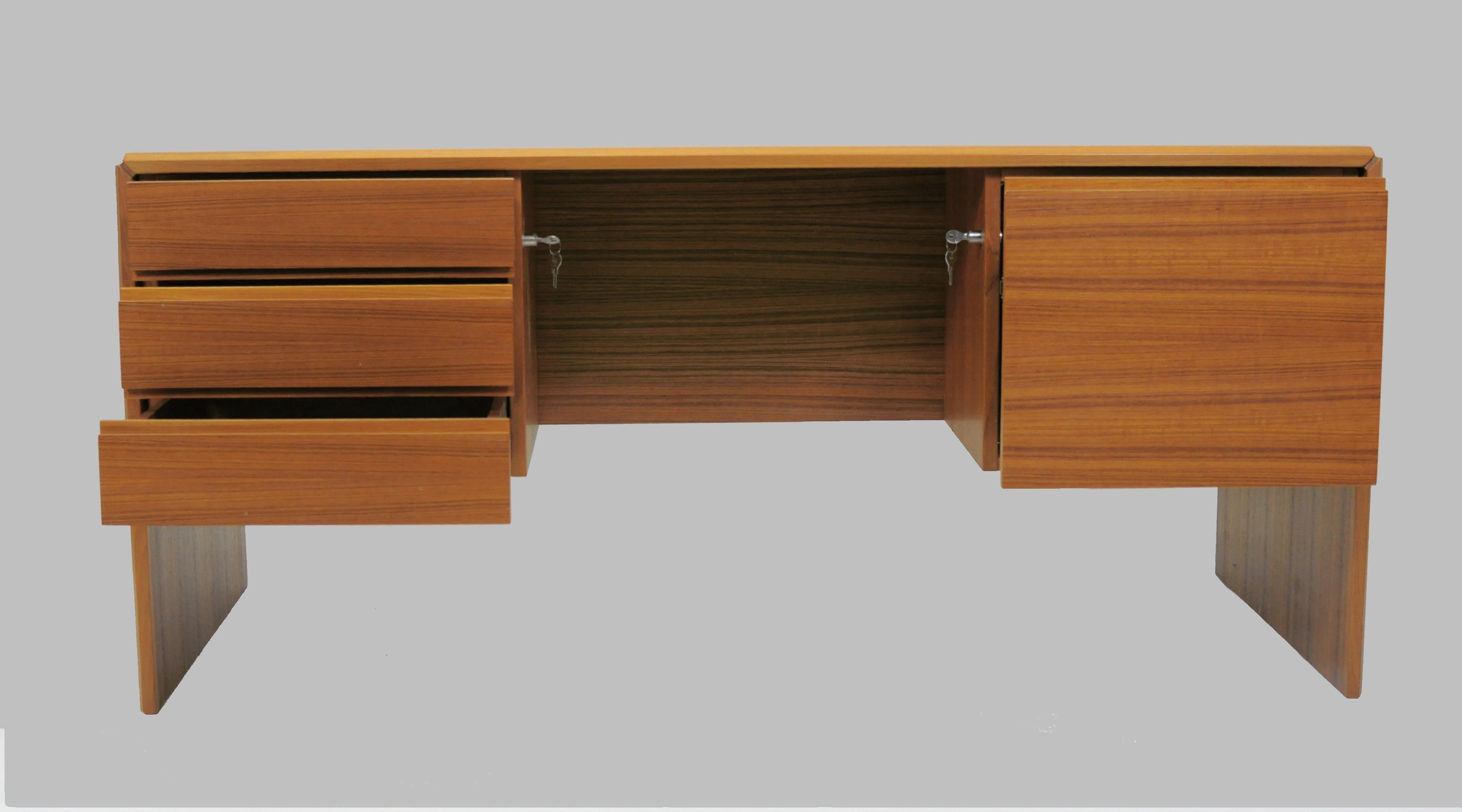 Desk in teak from the 1980s by Bent Silberg.

The well-made desk has been kept in storage since it was produced and has never been in use why it´s in perfect condition.

We ship our pieces by sea, air and land to most of the world on regular basis