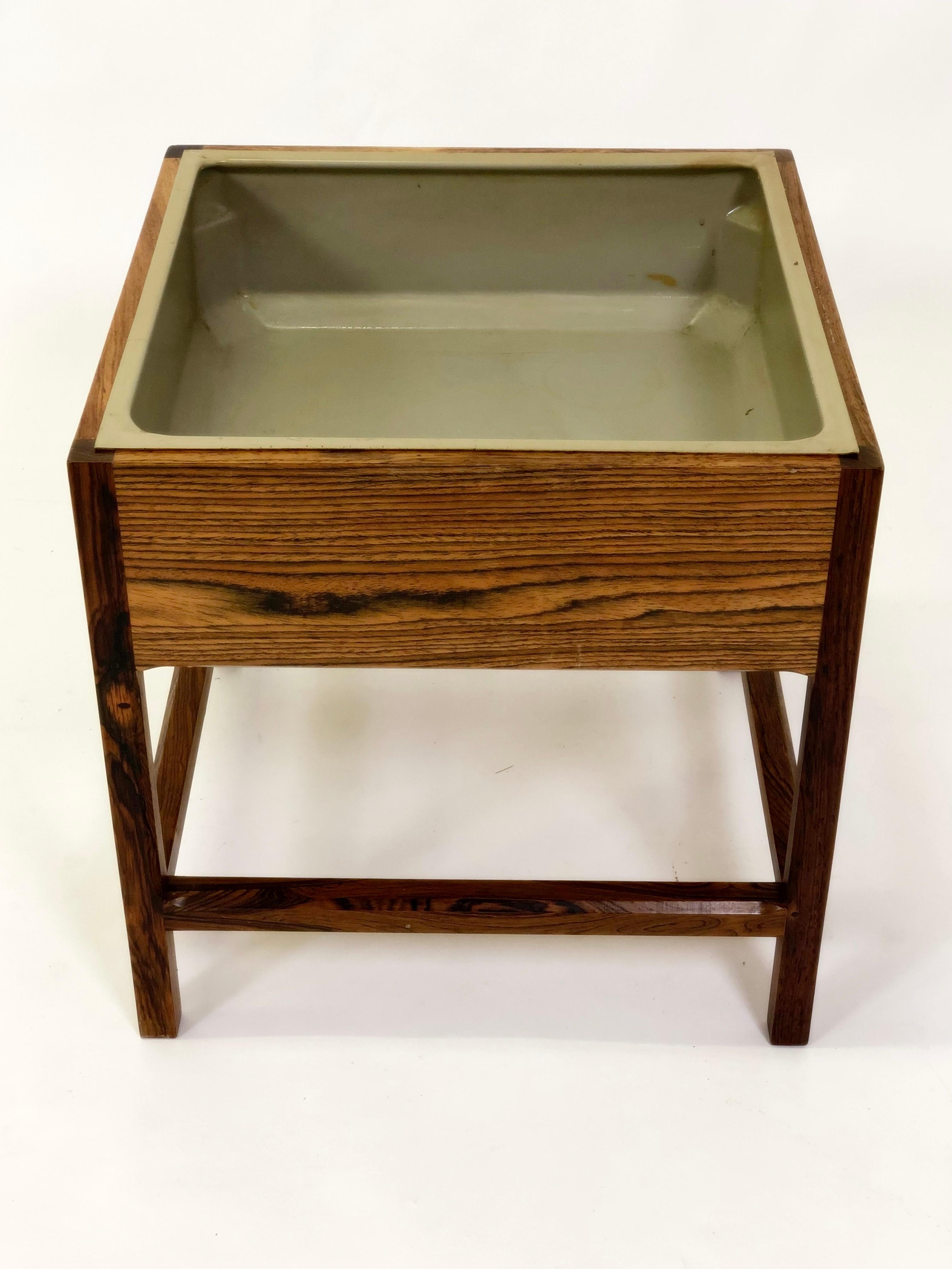 1960s Kai Kristiansen rosewood planter by Aksel Kjaersgaard.

The planter has been overlooked by our cabinetmaker and is in very good condition.