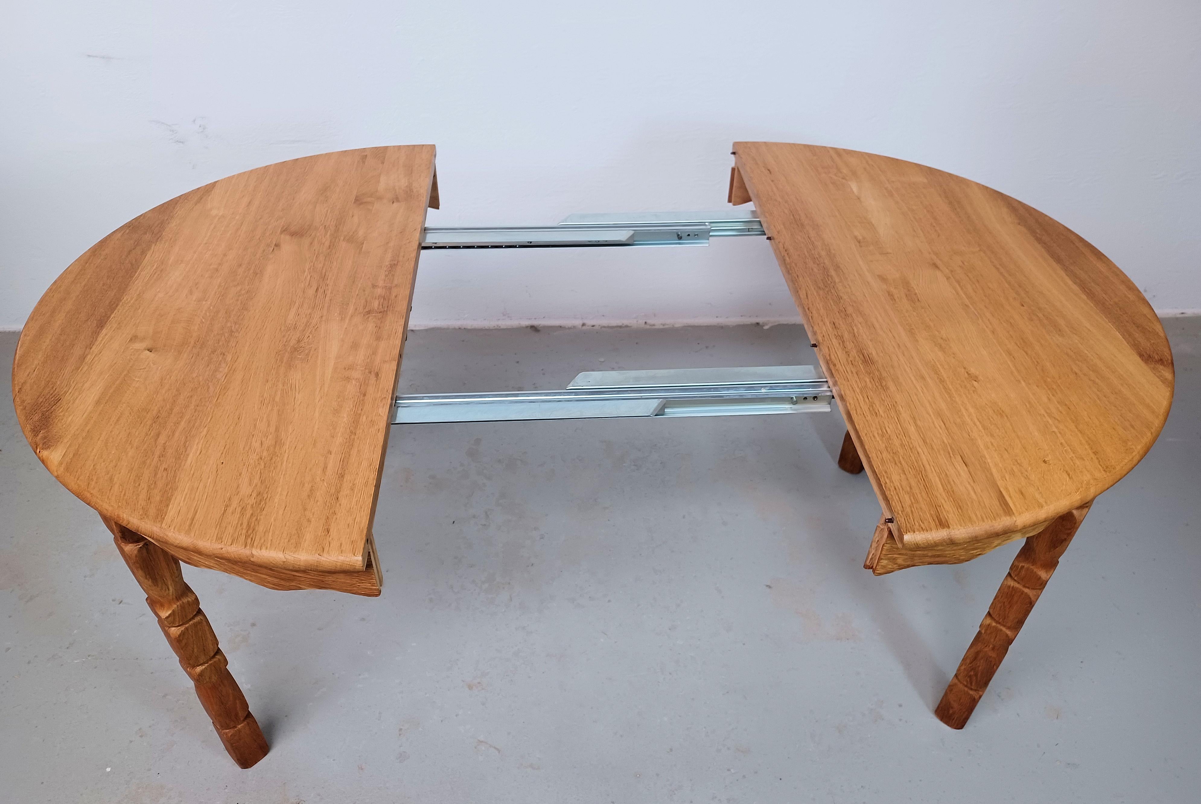 1970s Restored Henning Kjærnulf Dining Table in Solid Oak with Two Extensions In Good Condition For Sale In Knebel, DK