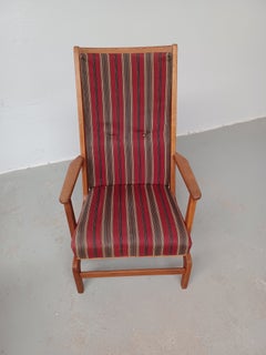 Silla mecedora danesa de los años 60, de estilo «Mid-Century Modern», con respaldo alto, en roble