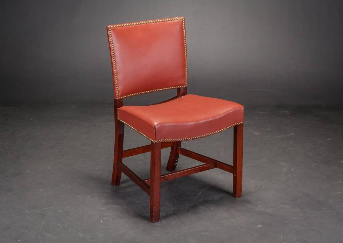 The Barcelona chairs were designed between 1927 and 1932 by Kaare Klint, who is considered to be the father of modern Danish furniture design. 

This chair was made by cabinetmaker Rud. Rasmussen in 1940, evidenced by his mark and production number