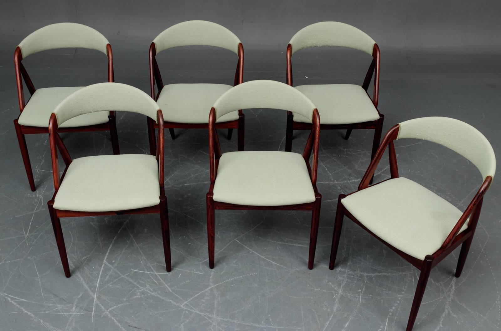 This set of six A-frame model 31 chairs were designed by Kai Kristiansen in 1956 for Schou-Andersens Møbelfabrik.

Model 31 is one of the most well-known chairs designed by Kai Kristiansen - a true Classic with it´s curved backrest, crooked angles,