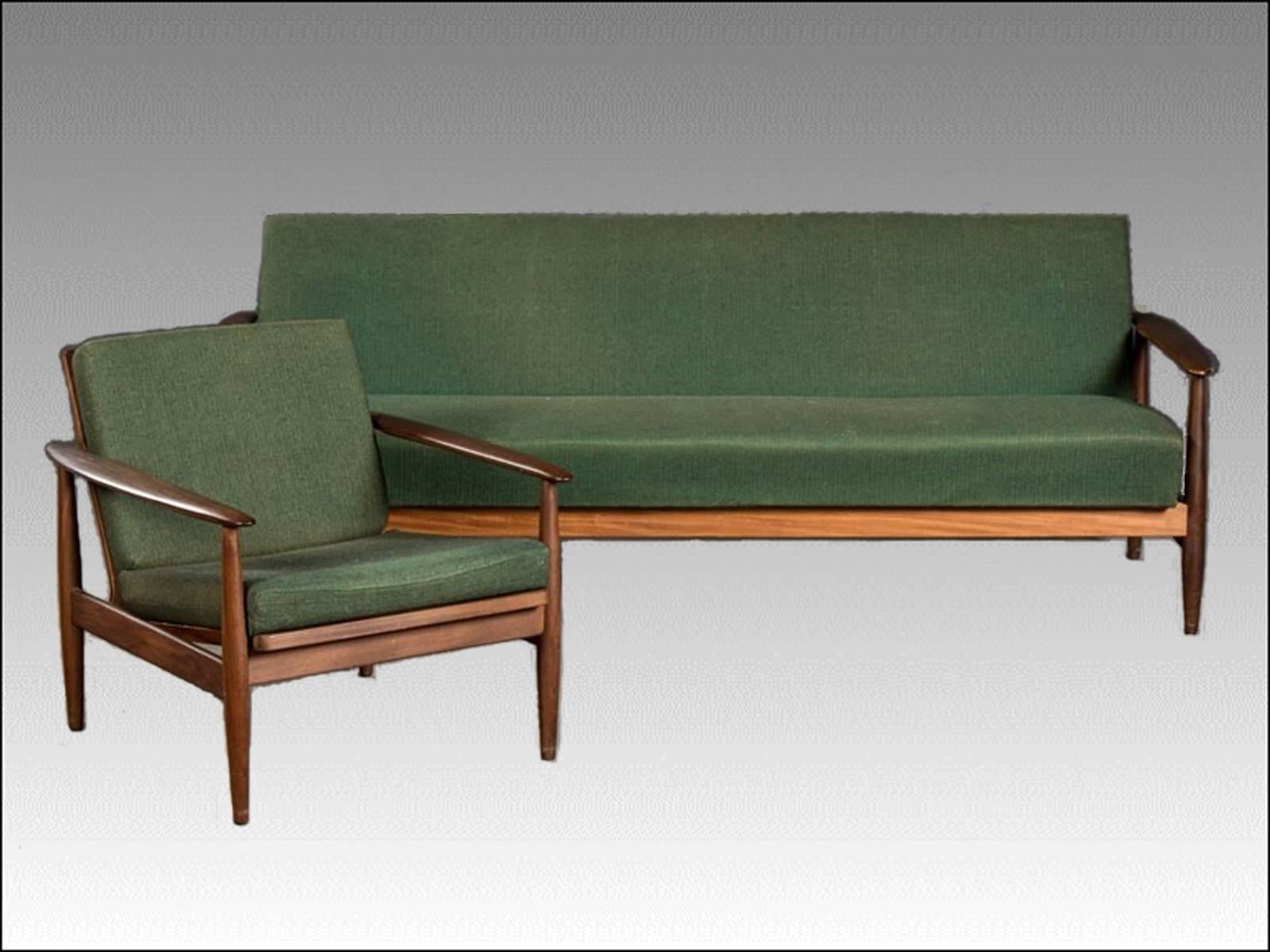 Grethe Jalk style sofabed and armchair from the 1960s in dark teak and dark green fabric upholstery.

Frames of sofabed and armchair and the upholstery on the sofabed is in very good condition. Fabric is old but not original and has some fading as