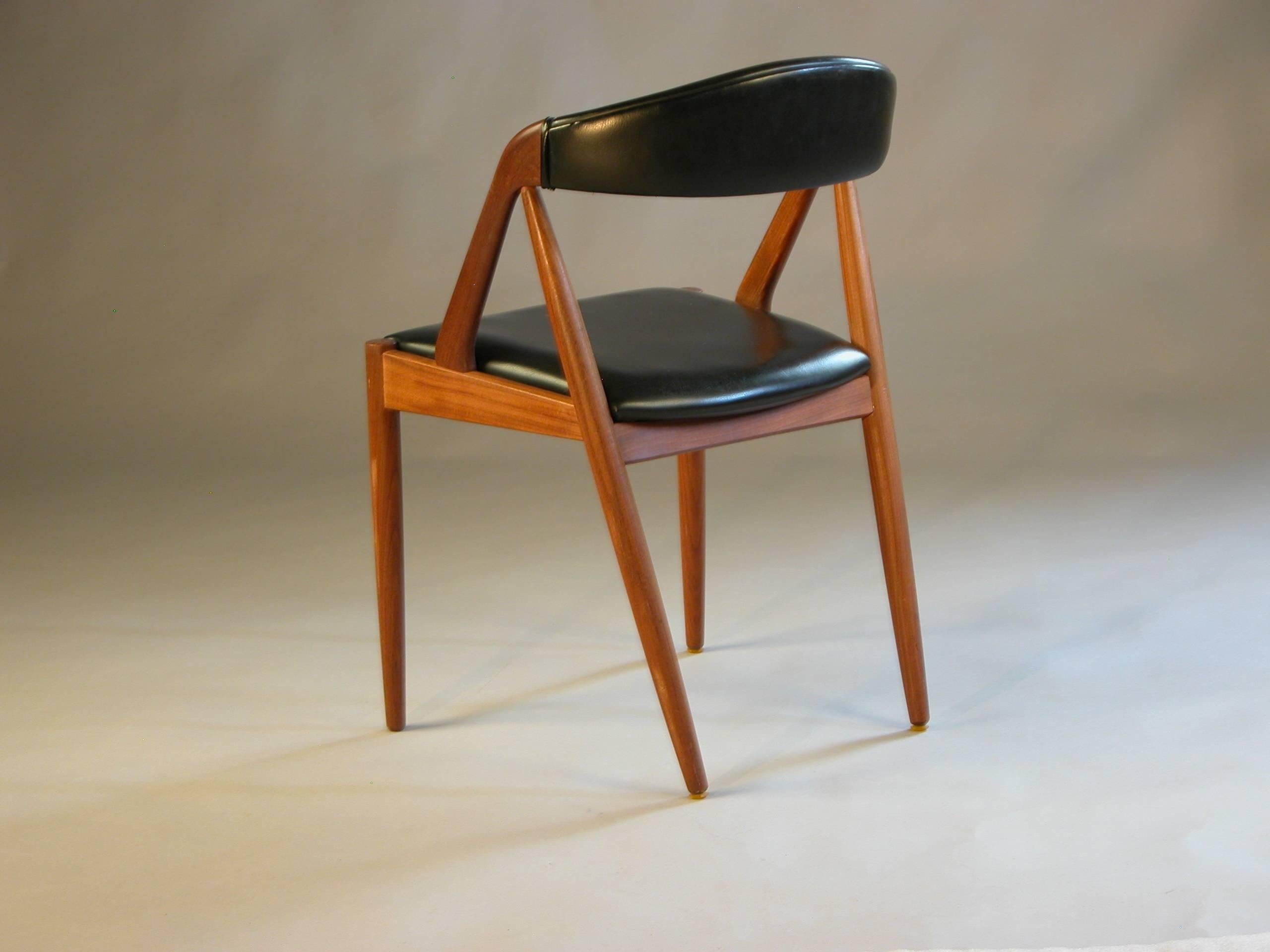 Scandinavian Modern 1960s Kai Kristiansen Model 31 Dining chairs in Teak and Black Leatherette