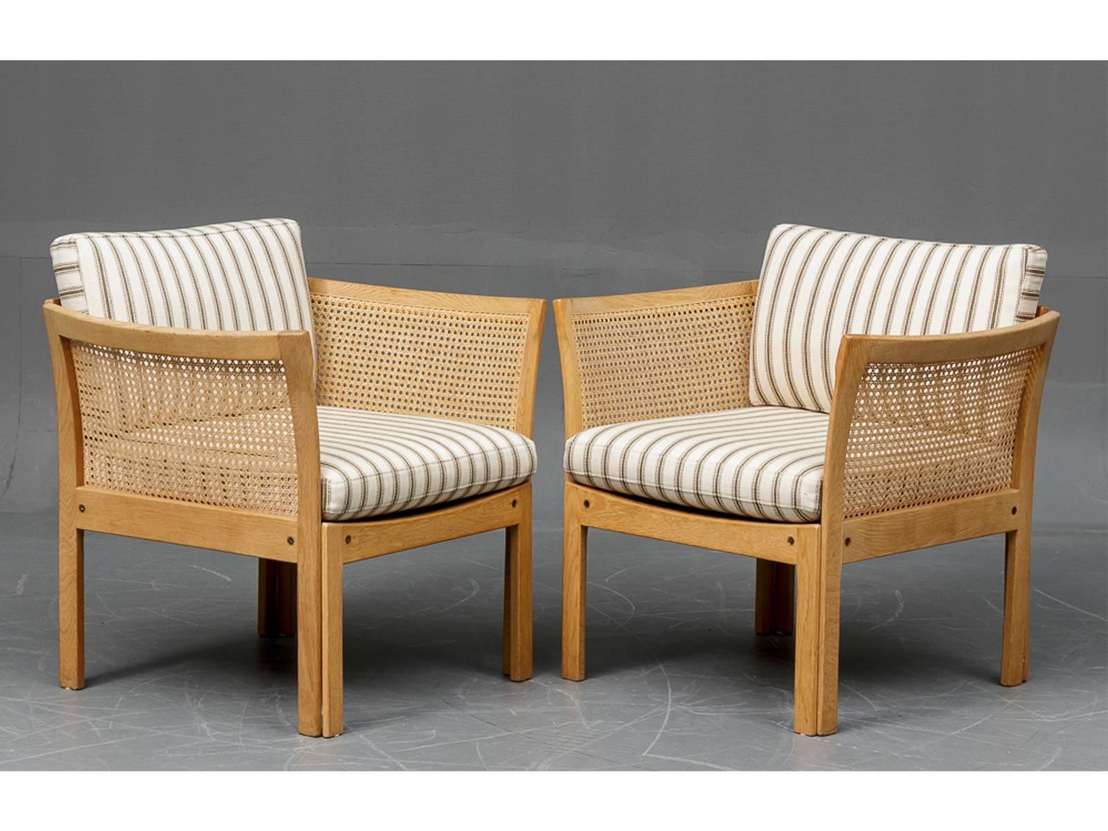 The Plexus easy chair was designed by Illum Wikkelsø in the late 1960s and produced in the 1970s by C. F. Christensen Silkeborg

The chair features oak frame with rattan armrests and cushions all in very good condition.

If you wish to have the