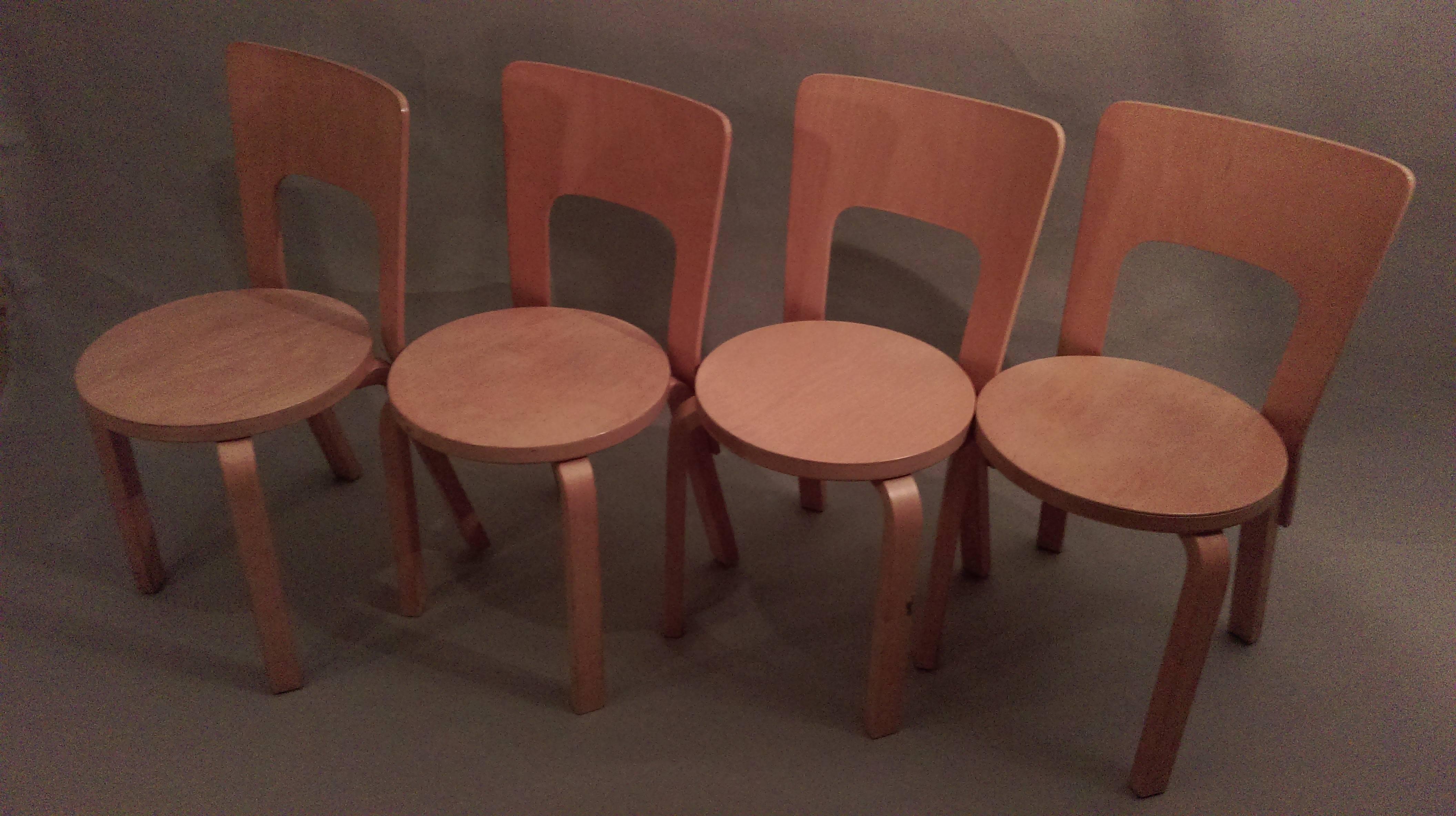 Set of four 1960s Alvar Aalto model 66 dinner chairs for Artek Finland. 

Scandinavian design with bent forms and elegant lines in birch plywood.

 