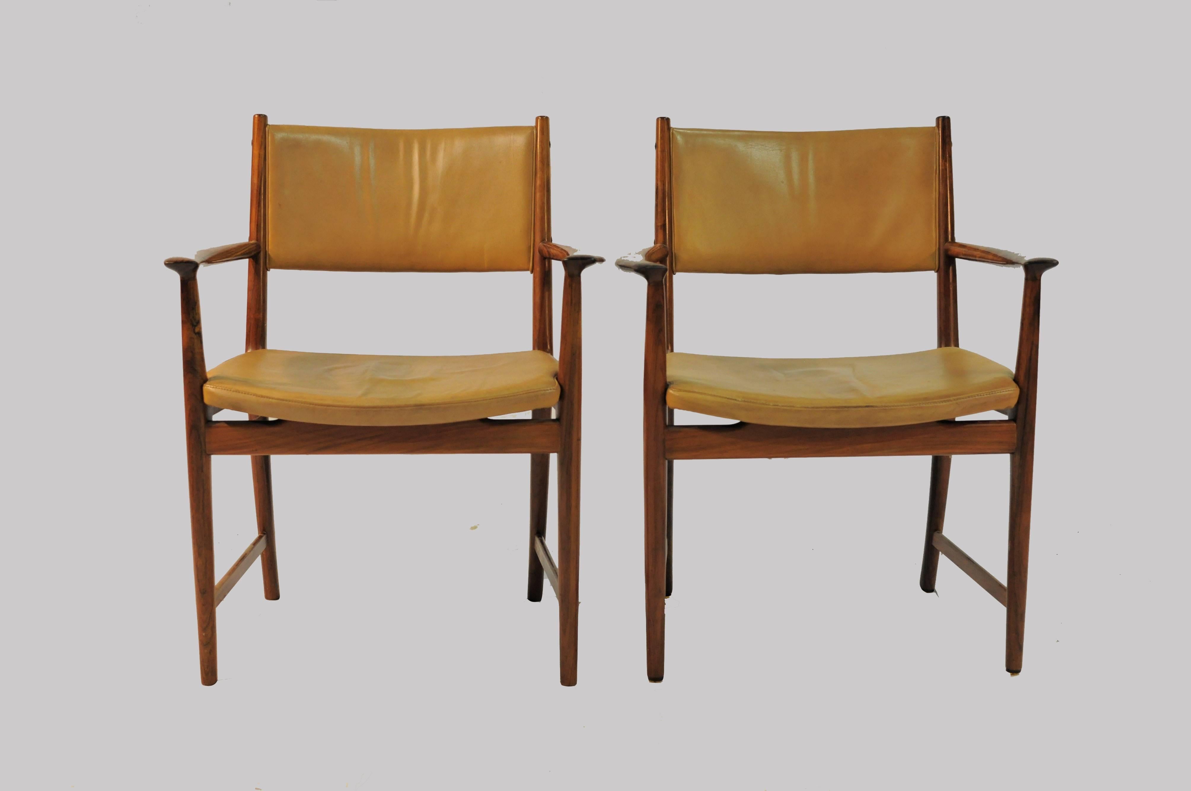 Set of two armchairs in rosewood upholstered with light brown leather designed by 
Kai Lyngfeldt Larsen. Produced by Søren Willadsen in Denmark, 1960s.