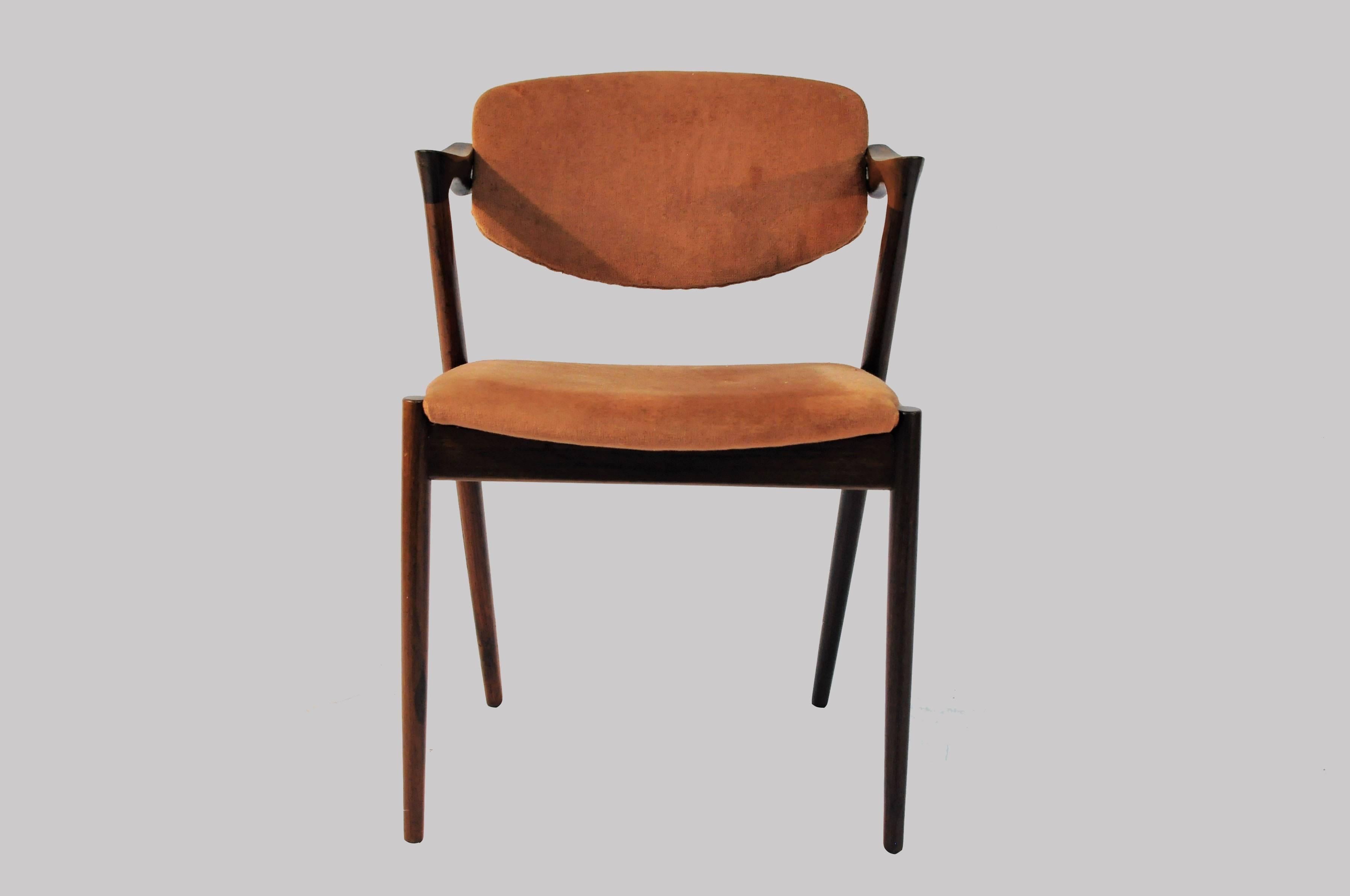 Model 42 rosewood dining chairs with adjustable backrest with different types of upholstery by Kai Kristiansen for Schous Møbelfabrik.

The chairs have Kai Kristiansens typical light and elegant design that make them fit in easily where you want