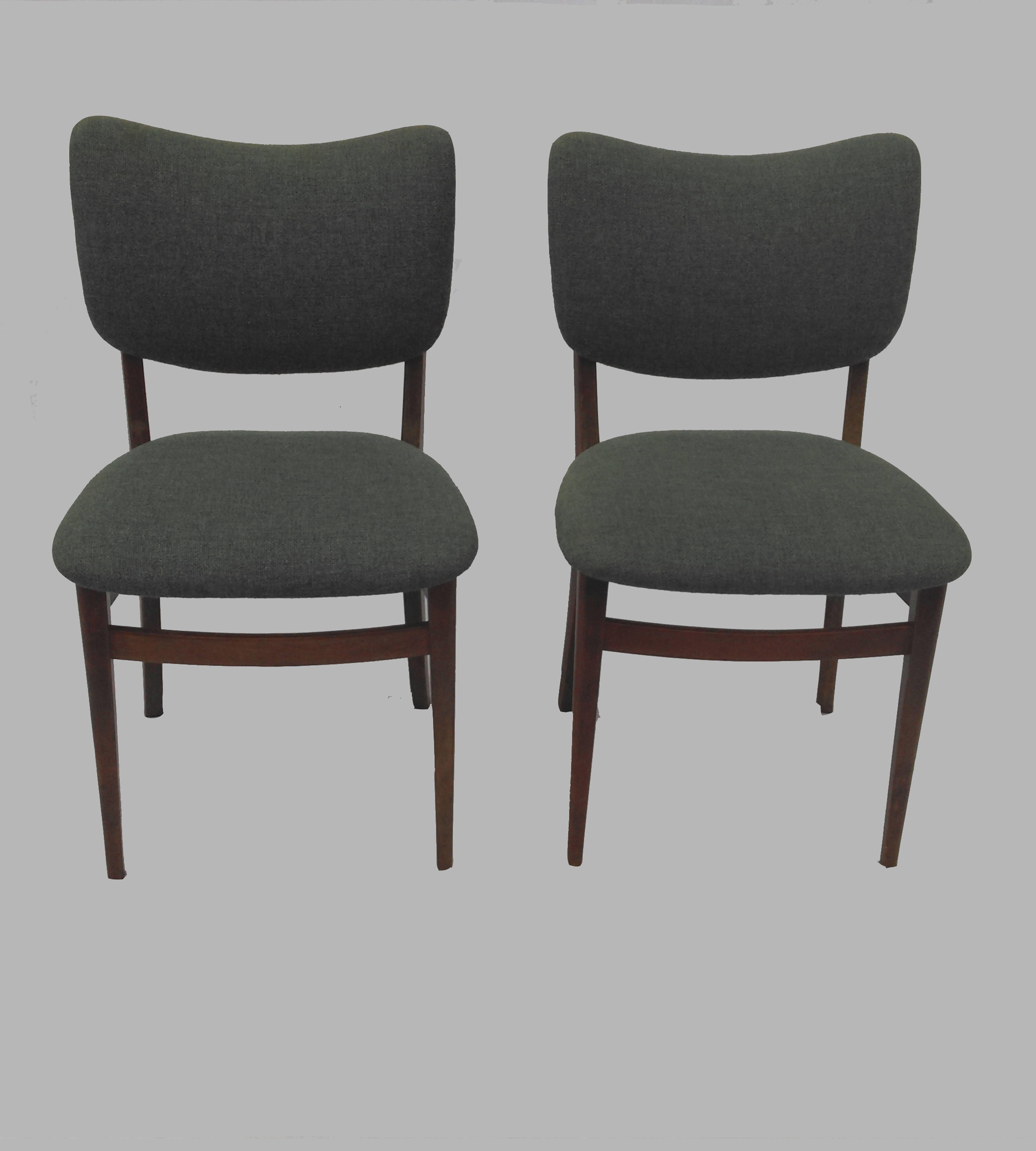 Set of two dining chairs or side chairs in tanned beech and blue fabric upholstery made by Danish cabinetmaker in the 1940s-1950s.

The chairs are well made and in good condition and feature lots of details with curves and elegant lines in both