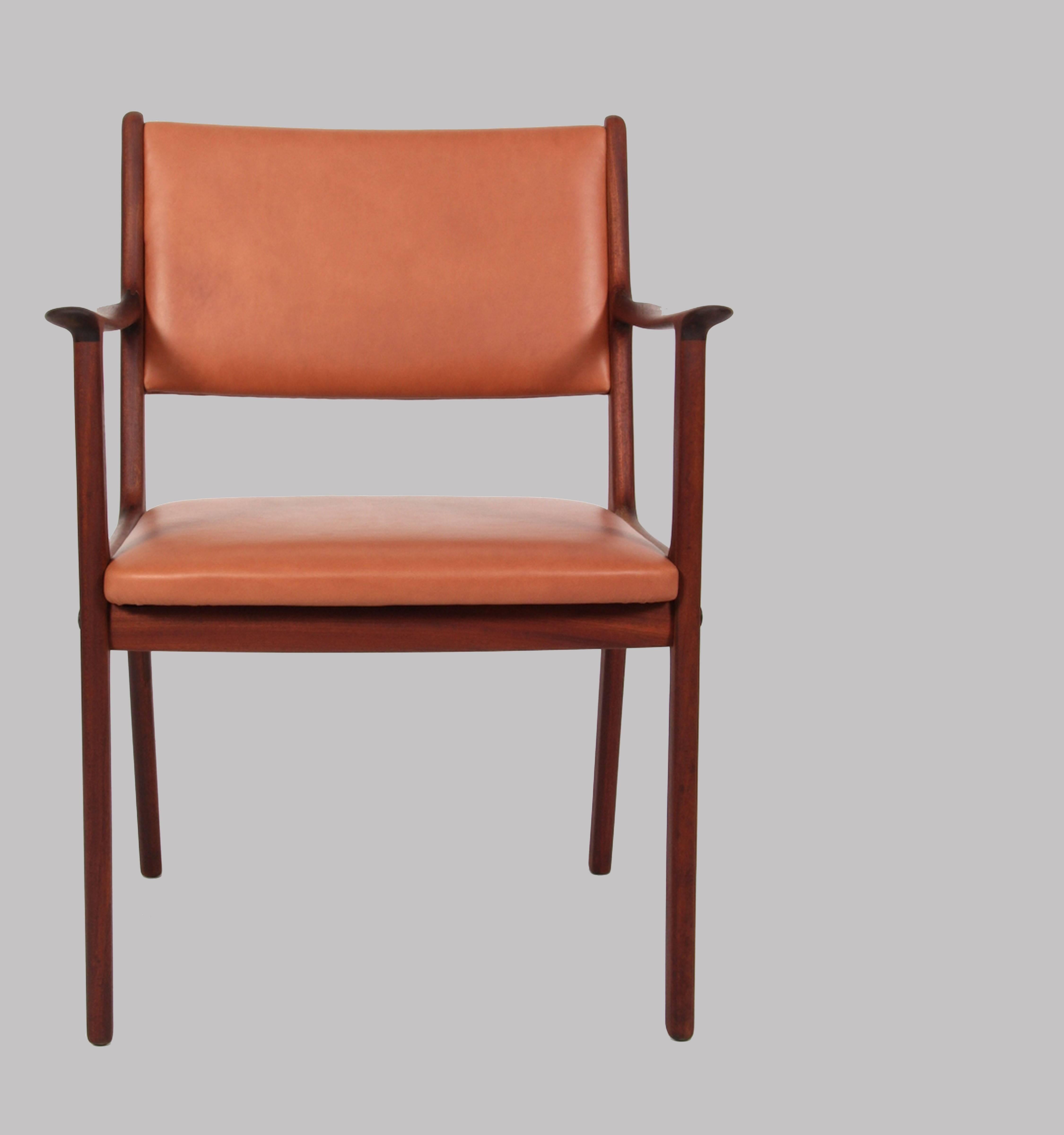 Set of five comfortable model PJ412 mahogany armchairs designed by Ole Wanscher for P.Jeppesens Møbelfabrik.

The chairs have been overlooked an refinished by our cabinetmaker and are in very good condition. The chairs have been reupholstered with