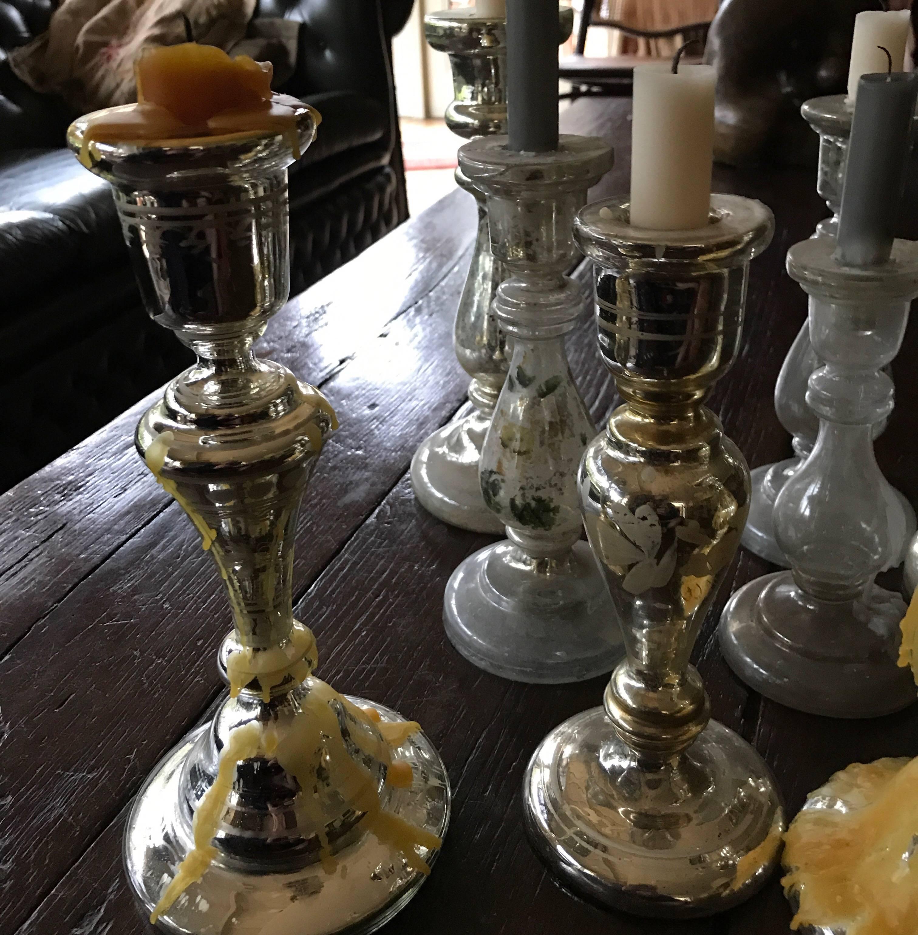 Collection off eight glass mercured, 19th century candlesticks
Old and timeless beautiful patina off vanishing old mercure on the inside off the glass candlesticks
Mercure was used to creatie a look off a silver candlestick
In fact it was the