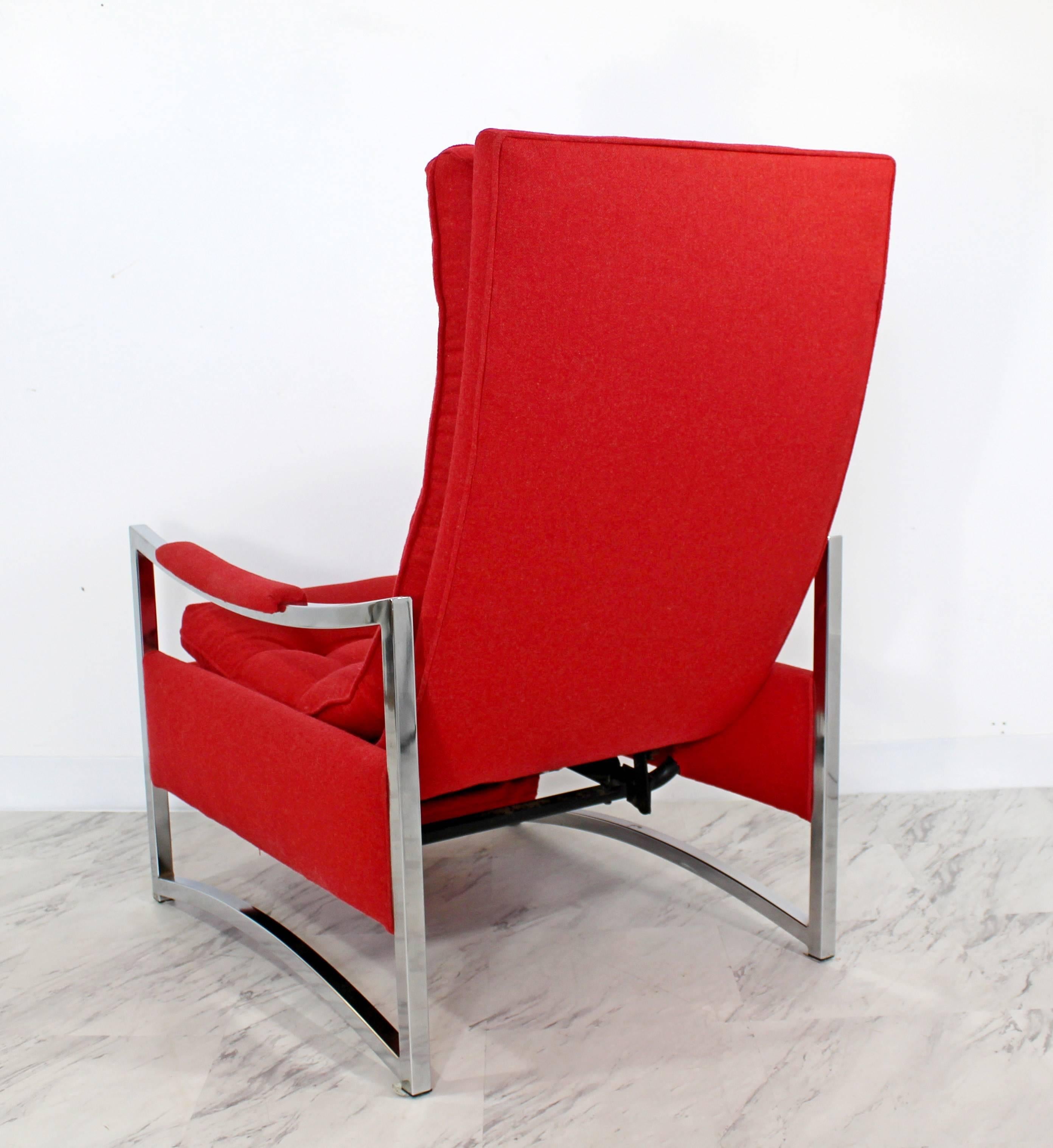 For your consideration is a glamorous, curved chrome recliner by Milo Baughman, recently redone in a red, Robert Allen wool. In excellent condition. The dimensions are 24.5" W x 36" (3')/58" D x 39" H x 17" S.H.