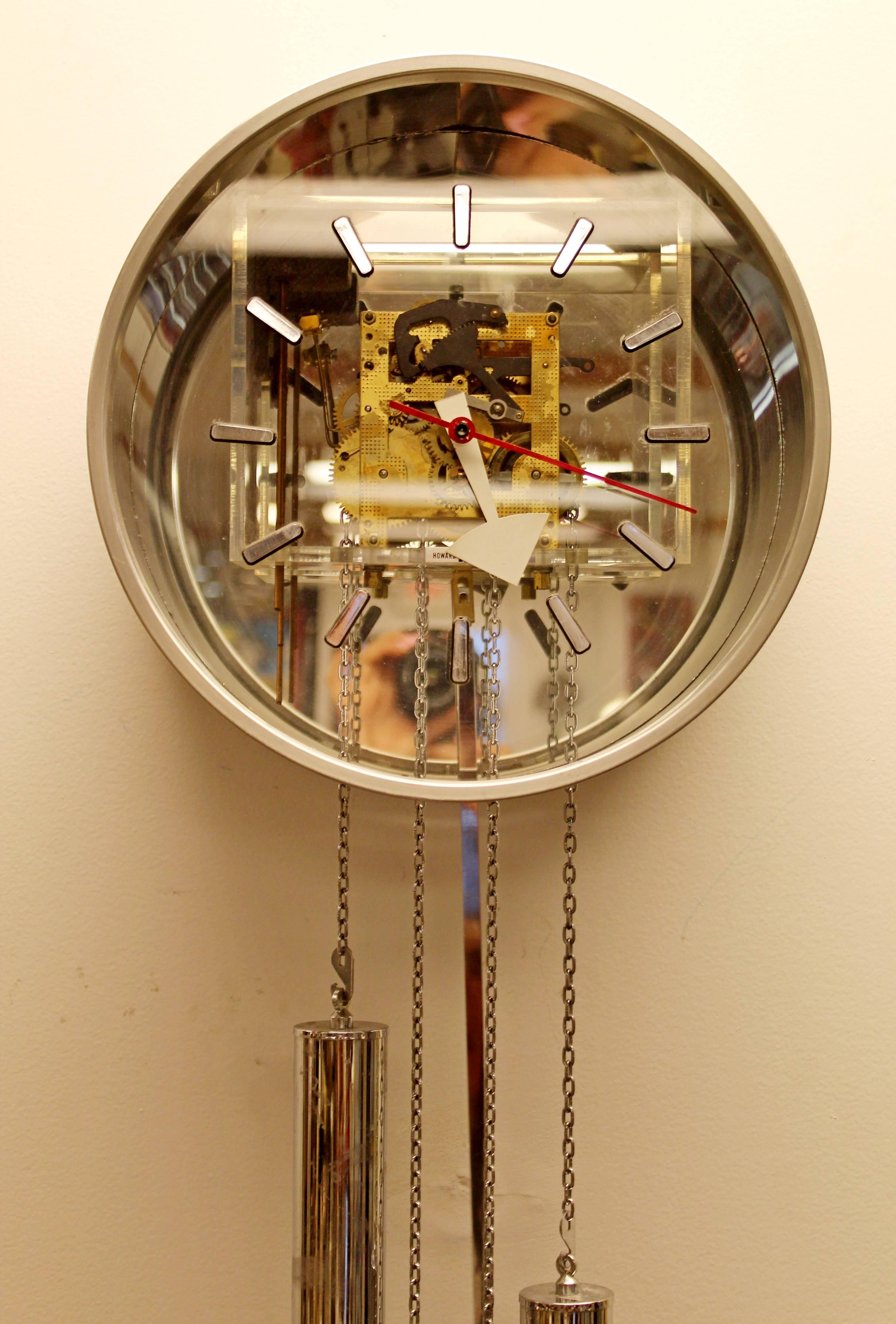 chrome pendulum wall clock