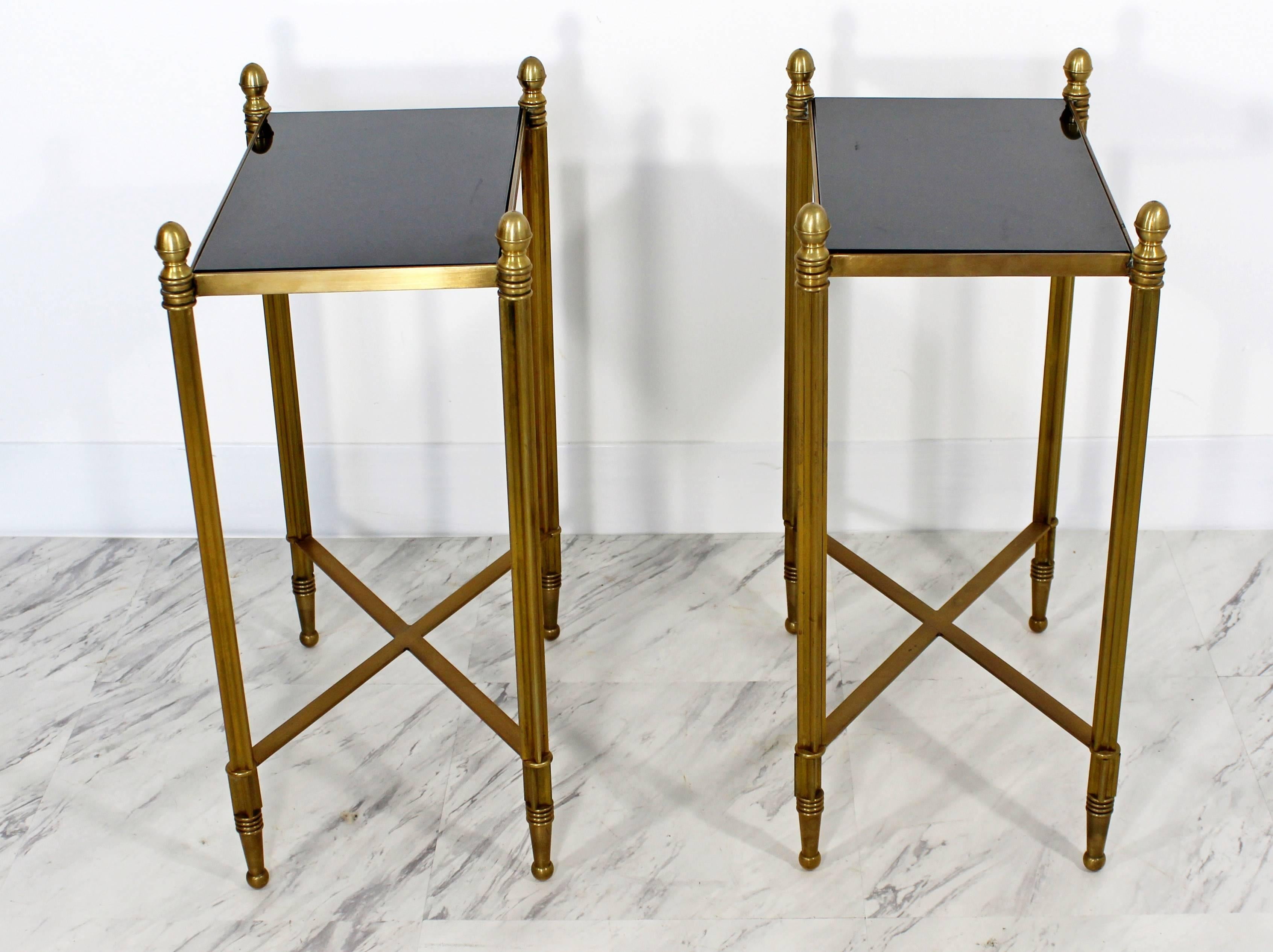 For your consideration is a beautiful, sturdy pair of bronze, acorn side tables, with black granite tops, from Global Views Furniture. In excellent condition. The dimensions are 9