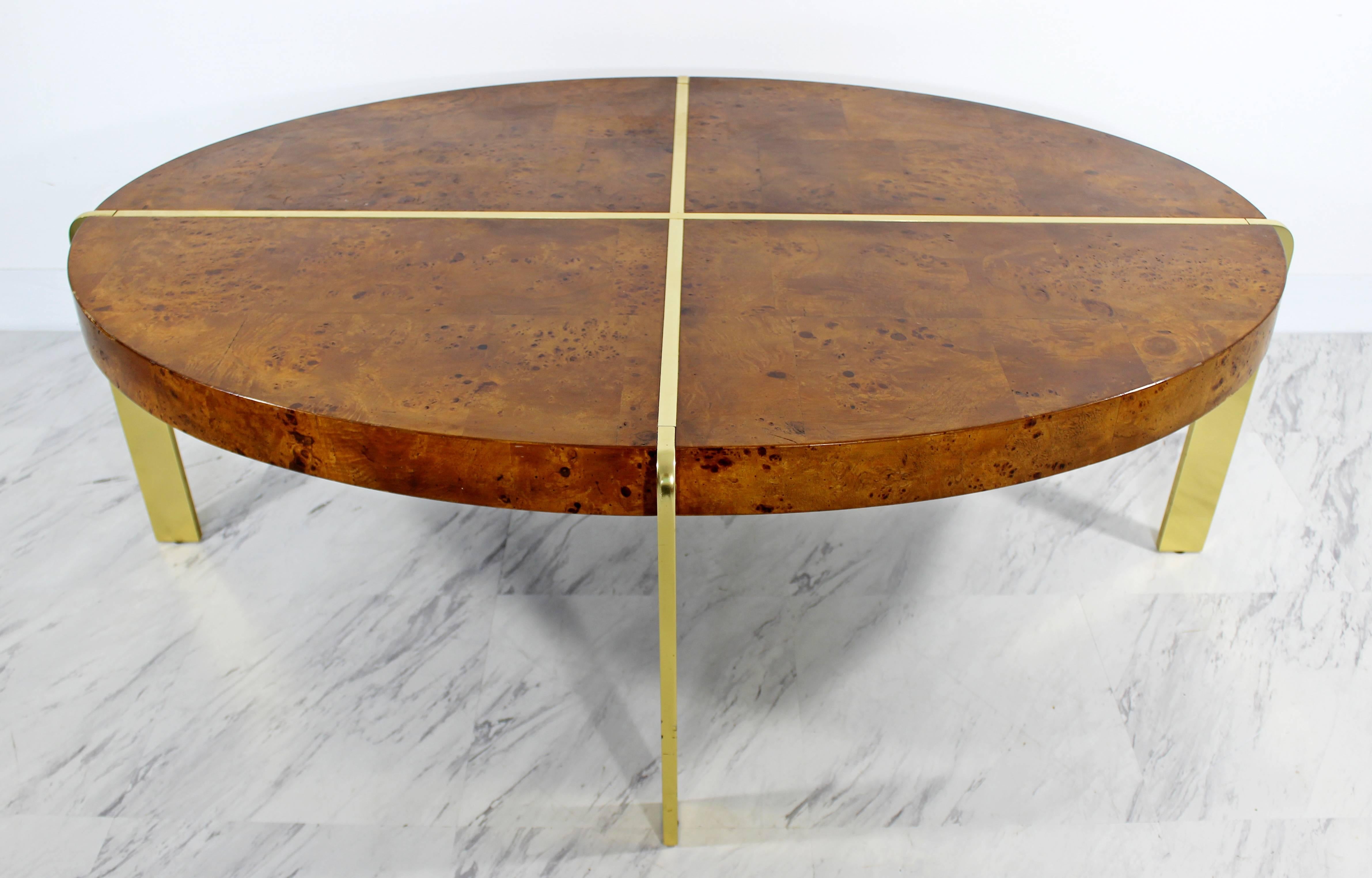 For your consideration is a gorgeous, burl wood coffee table, with brass, by Milo Baughman. In excellent condition. The dimensions are 46