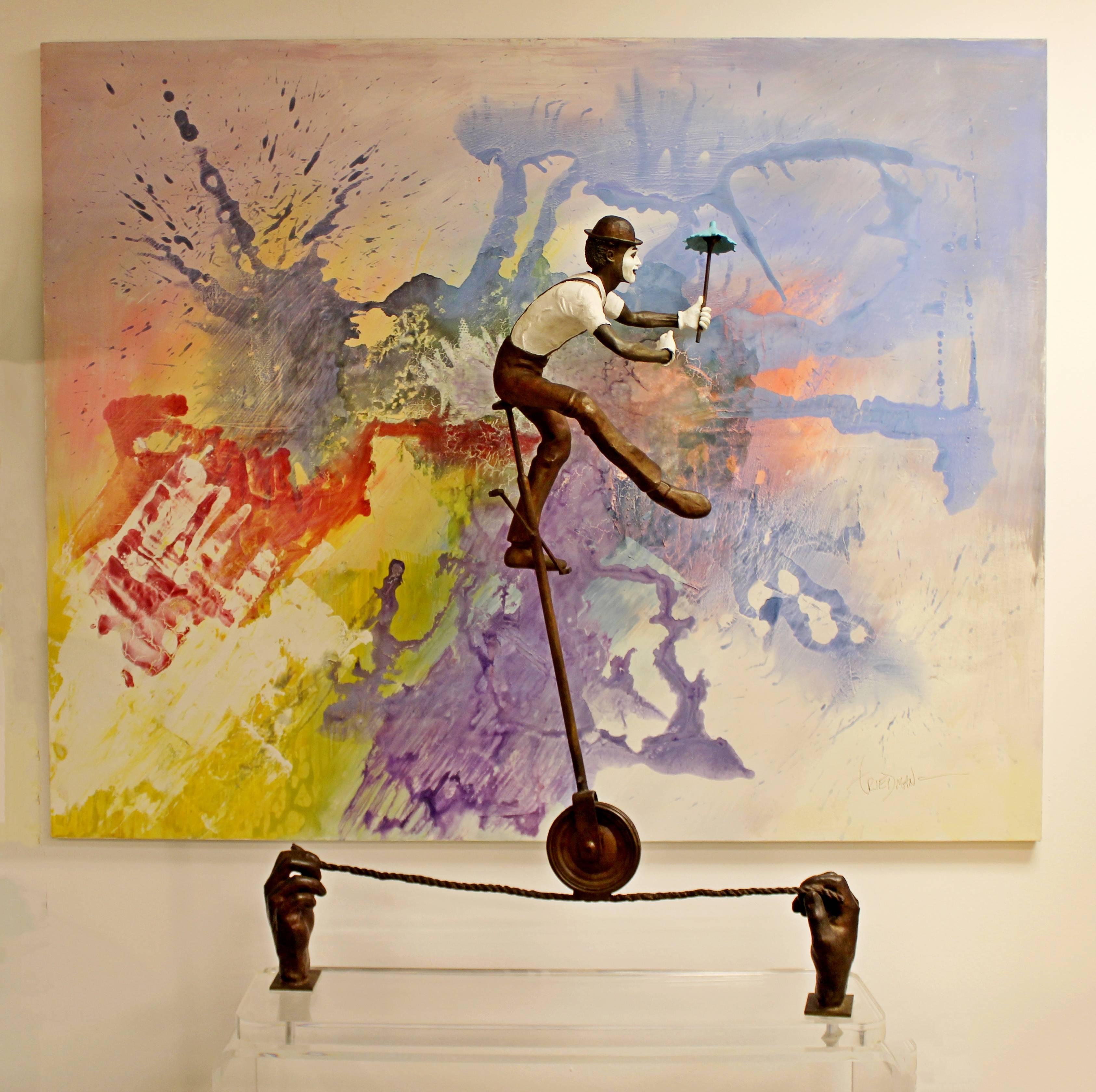 For your consideration is a fantastic, bronze table sculpture of a balancing man, on a Lucite base, entitled 