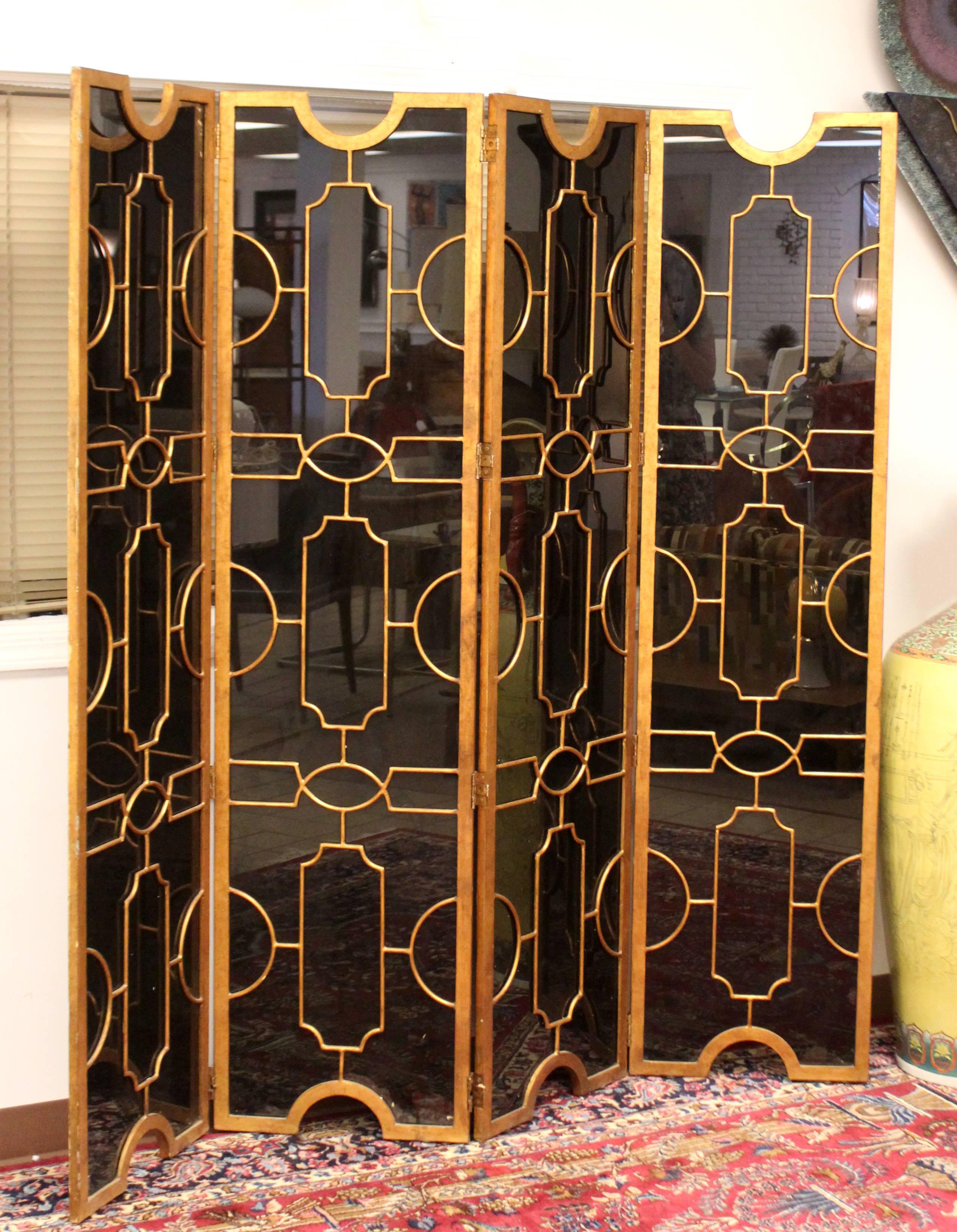 For your consideration is an absolutely stunning, black glass and bronze, intricately designed, folding panel room divider, from the Art Deco period. In excellent condition. The dimensions are 18