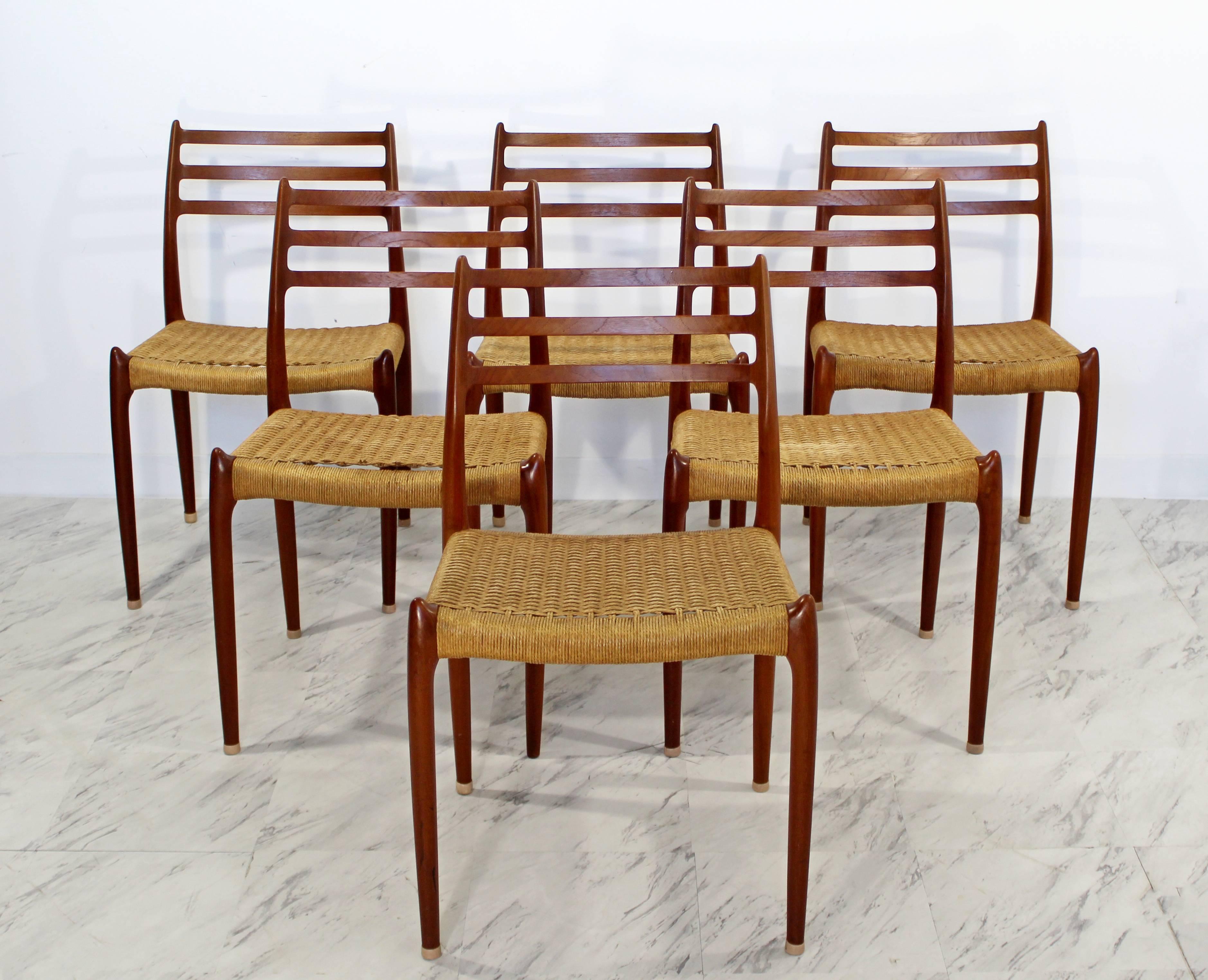 For your consideration is a fabulous set of six dining chairs, made of teak and with rush cord seats, from Denmark, by Nils Jonsson for Moller. In good vintage condition, as shown in pictures. Full dining set is available in separate listing. The