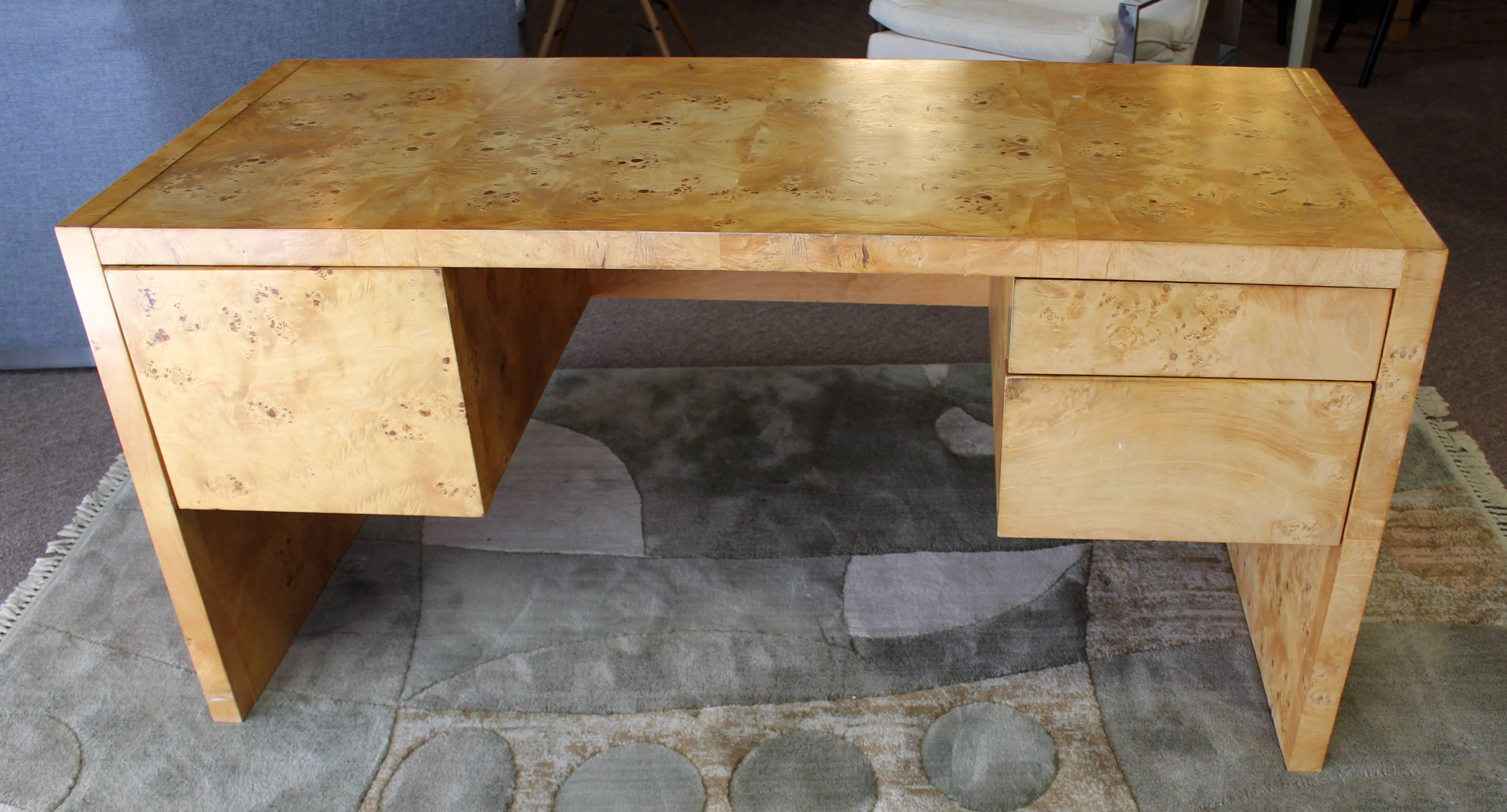 For your consideration is a phenomenally unique desk, made of burl wood, with three drawers, by Milo Baughman in the 1970s. In excellent condition. The dimensions are 60