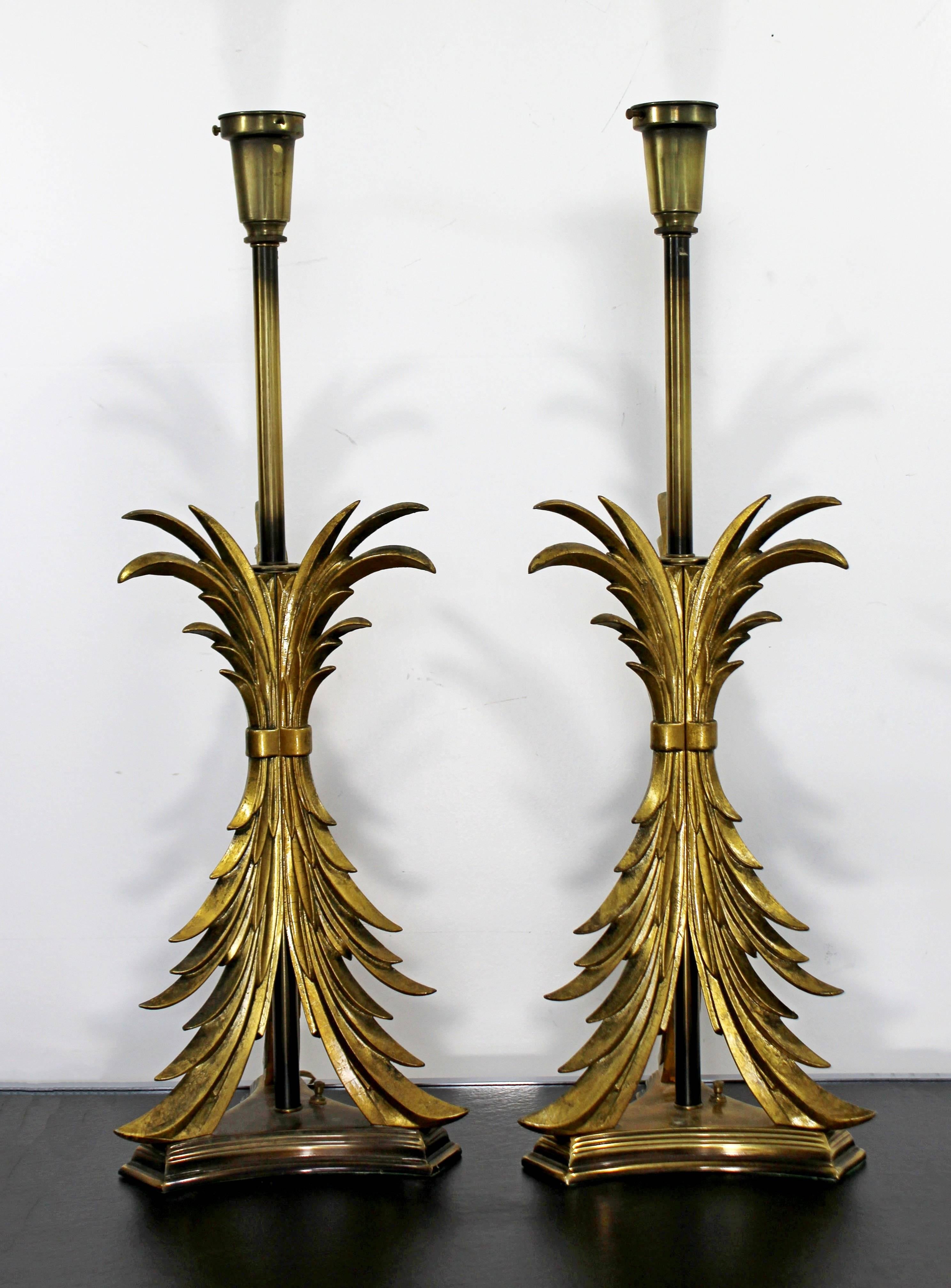 For your consideration is a wonderful pair of Hollywood Regency, solid brass table lamps by Chapman, circa the 1980s. In excellent condition. The dimensions are 10