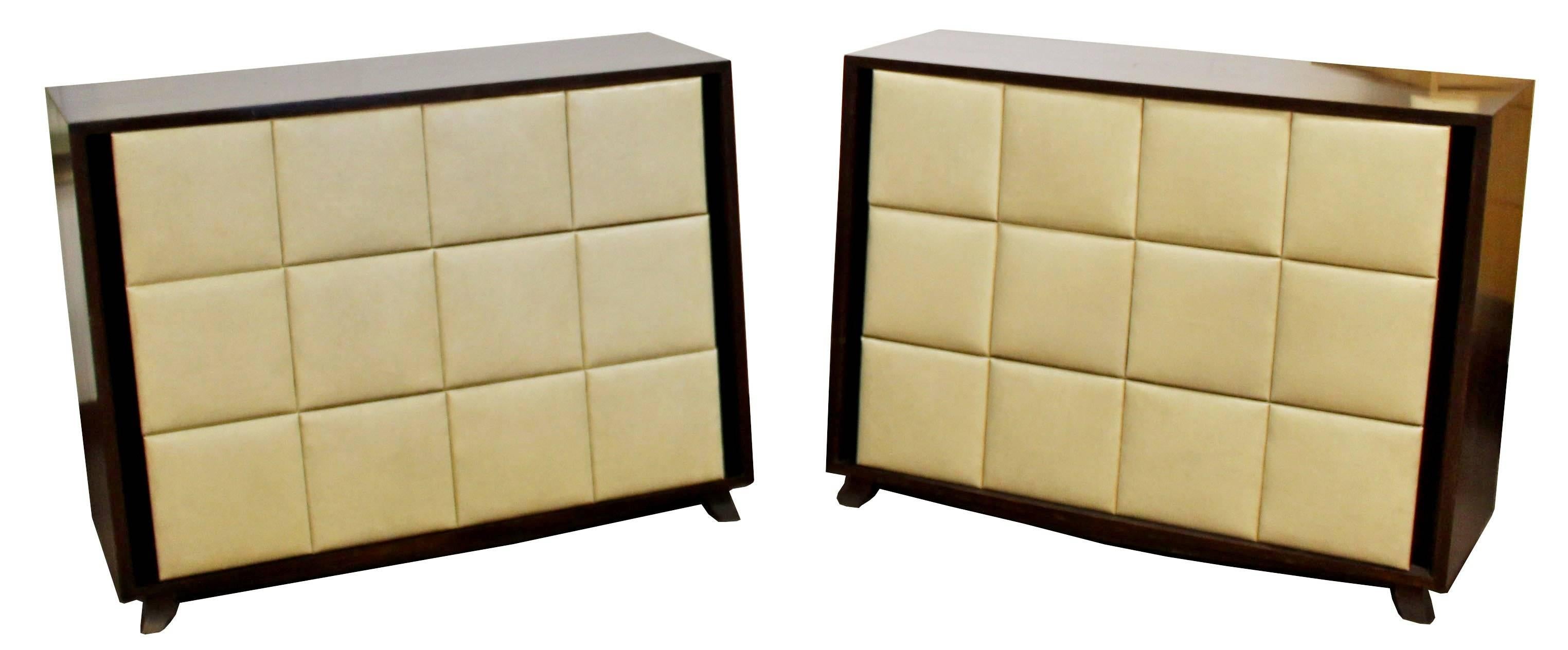 For your consideration is a magnificent pair of mahogany dressers, with three padded, cream leather drawers, by Gilbert Rohde for Herman Miller, circa 1930s. In excellent condition. The dimensions are 44.5