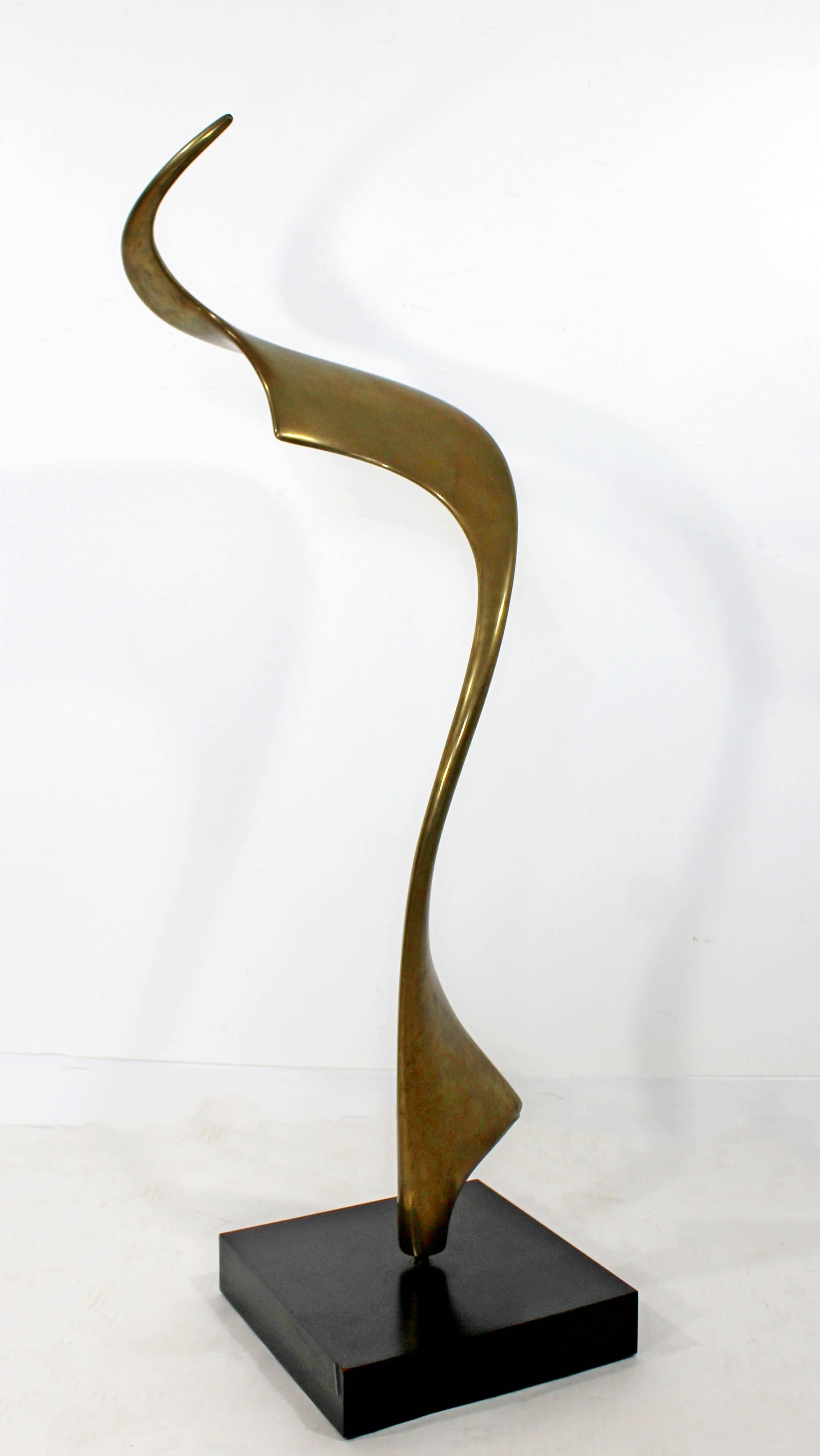 For your consideration is a lovely, abstract, bronze table sculpture. In excellent condition. The dimensions are 10