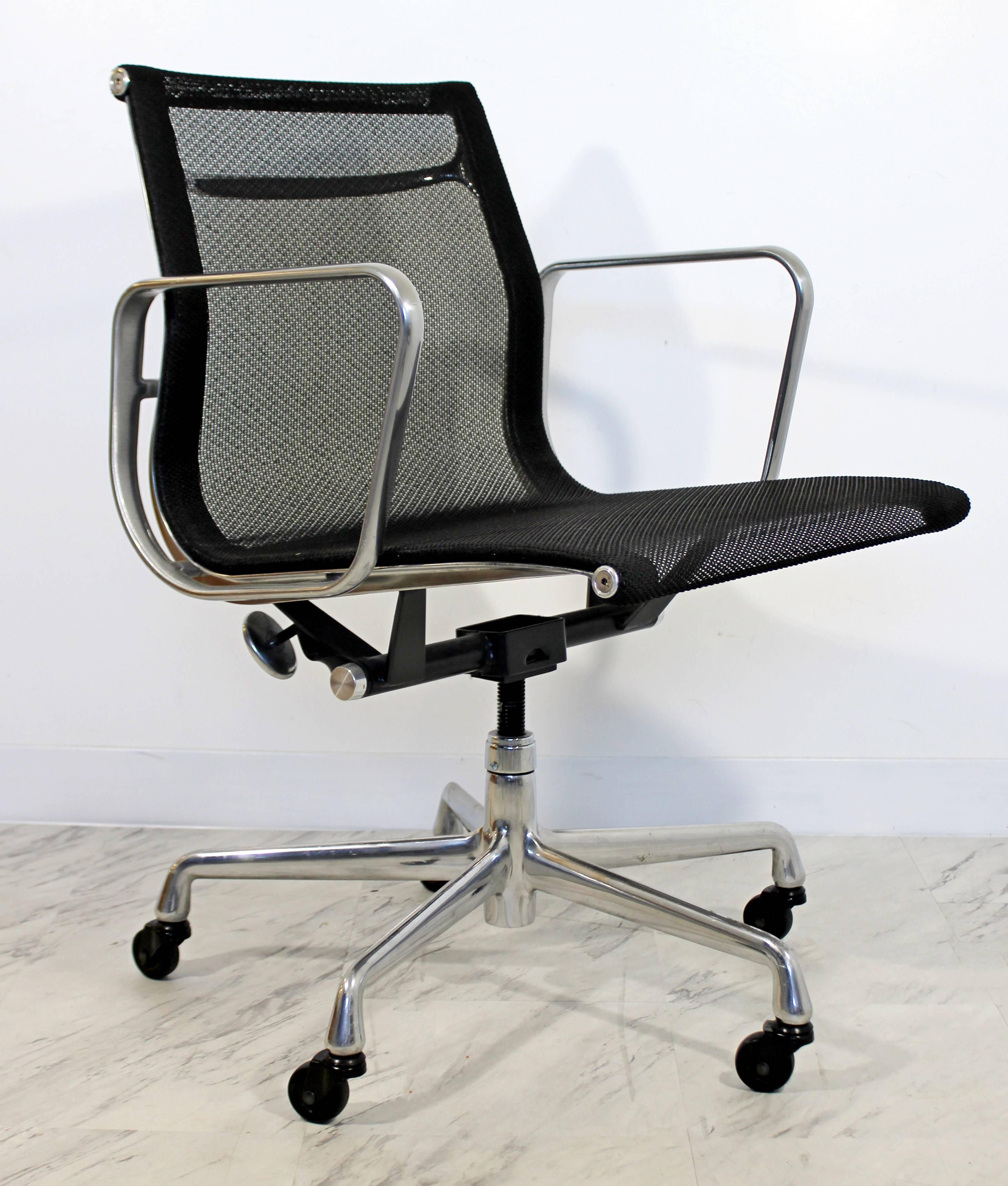 For your consideration is a fantastic set of six, aluminum group swivel, office chairs on casters, by Herman Miller. This set is a part of a 50th anniversary reproduction, circa 2008. In excellent condition. The dimensions are 22