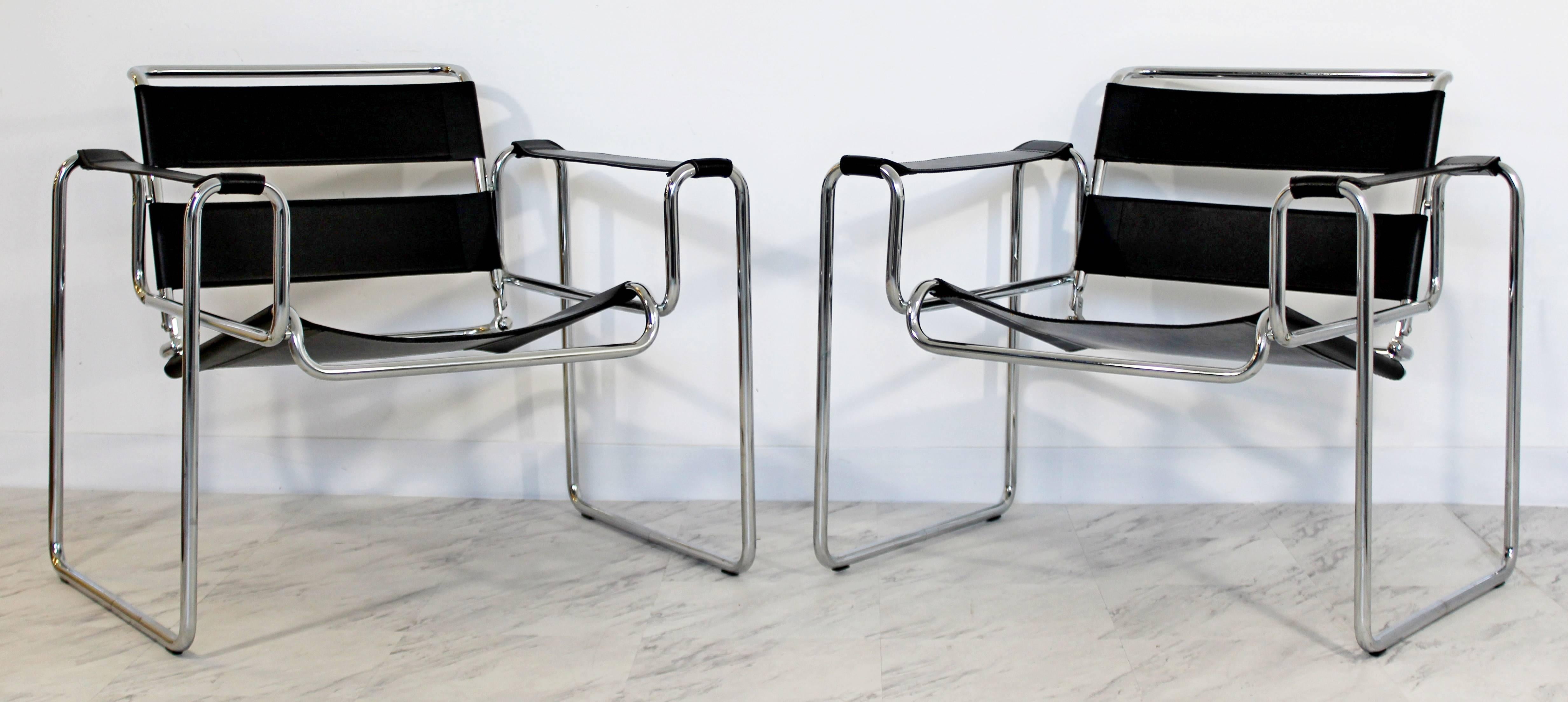 For your consideration is a gorgeous pair of original vintage Marcel Breuer for Stendig Wassily lounge chairs, made of black leather and chrome, circa 1960s. In excellent condition. The dimensions are 32