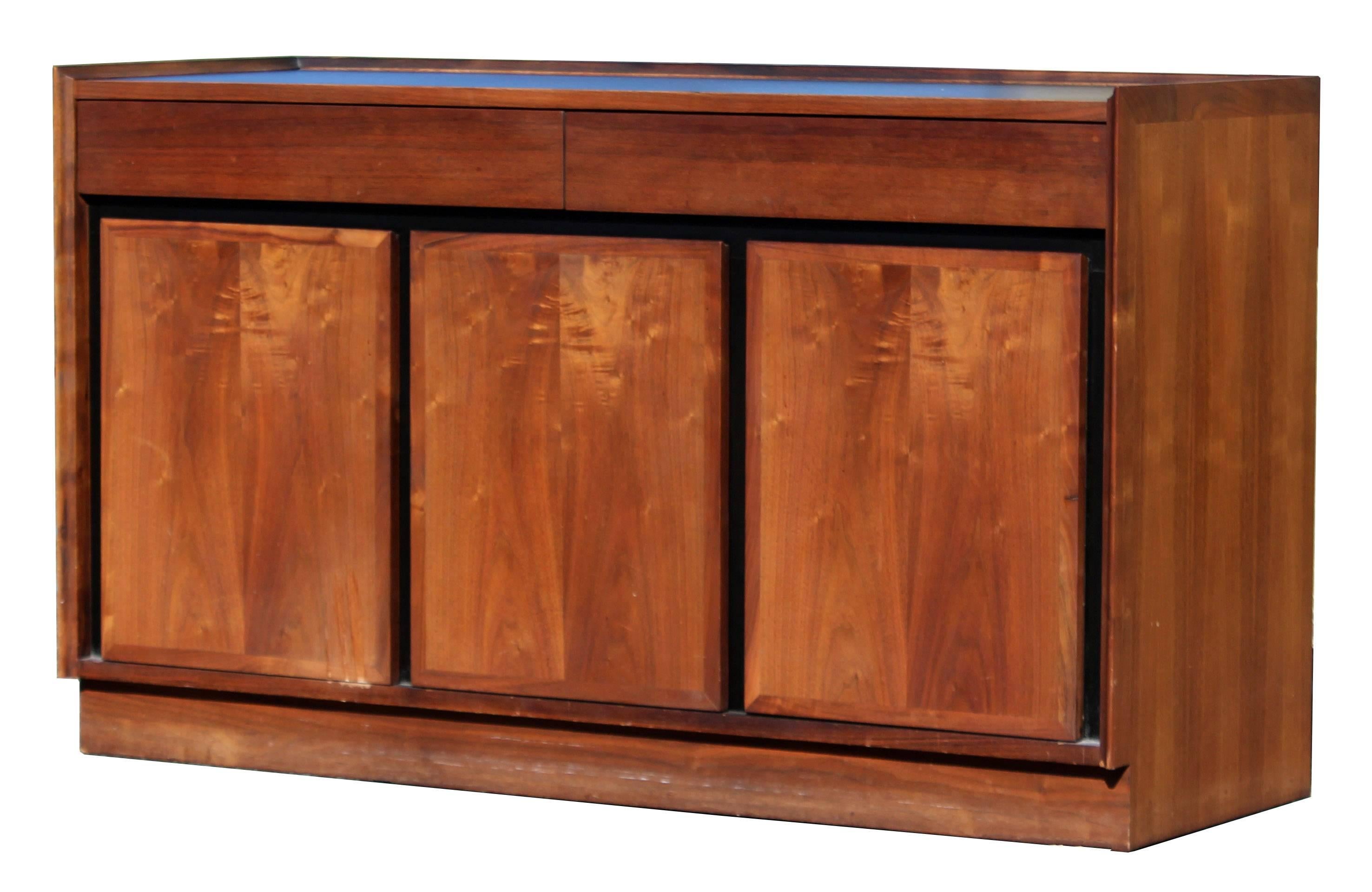 For your consideration is a lovely, walnut, credenza sideboard, with three drawers, by Merton Gershun for Dillingham, circa 1970s. In excellent condition. The dimensions are 52