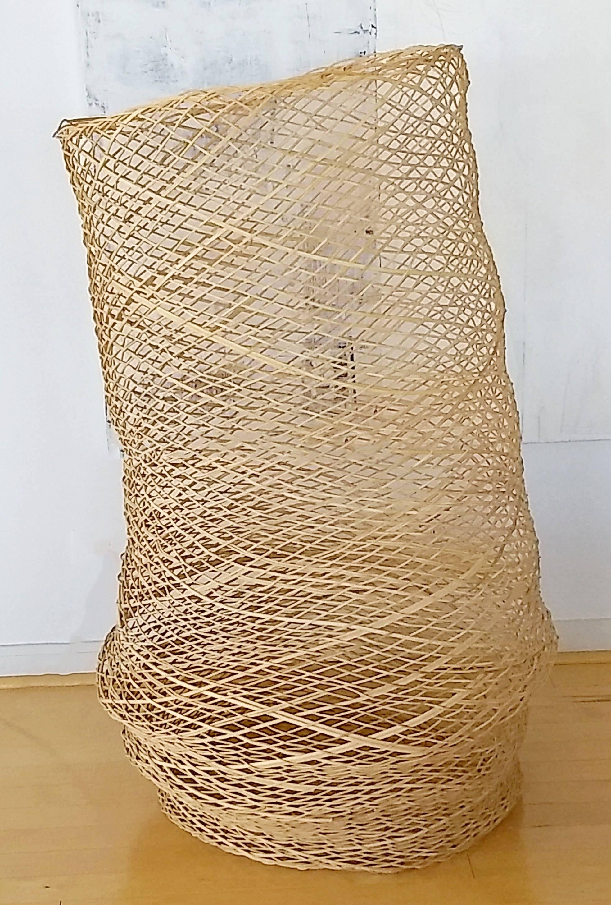 For your consideration is a great, woven floor sculpture of a basket. In excellent condition. The dimensions are 28
