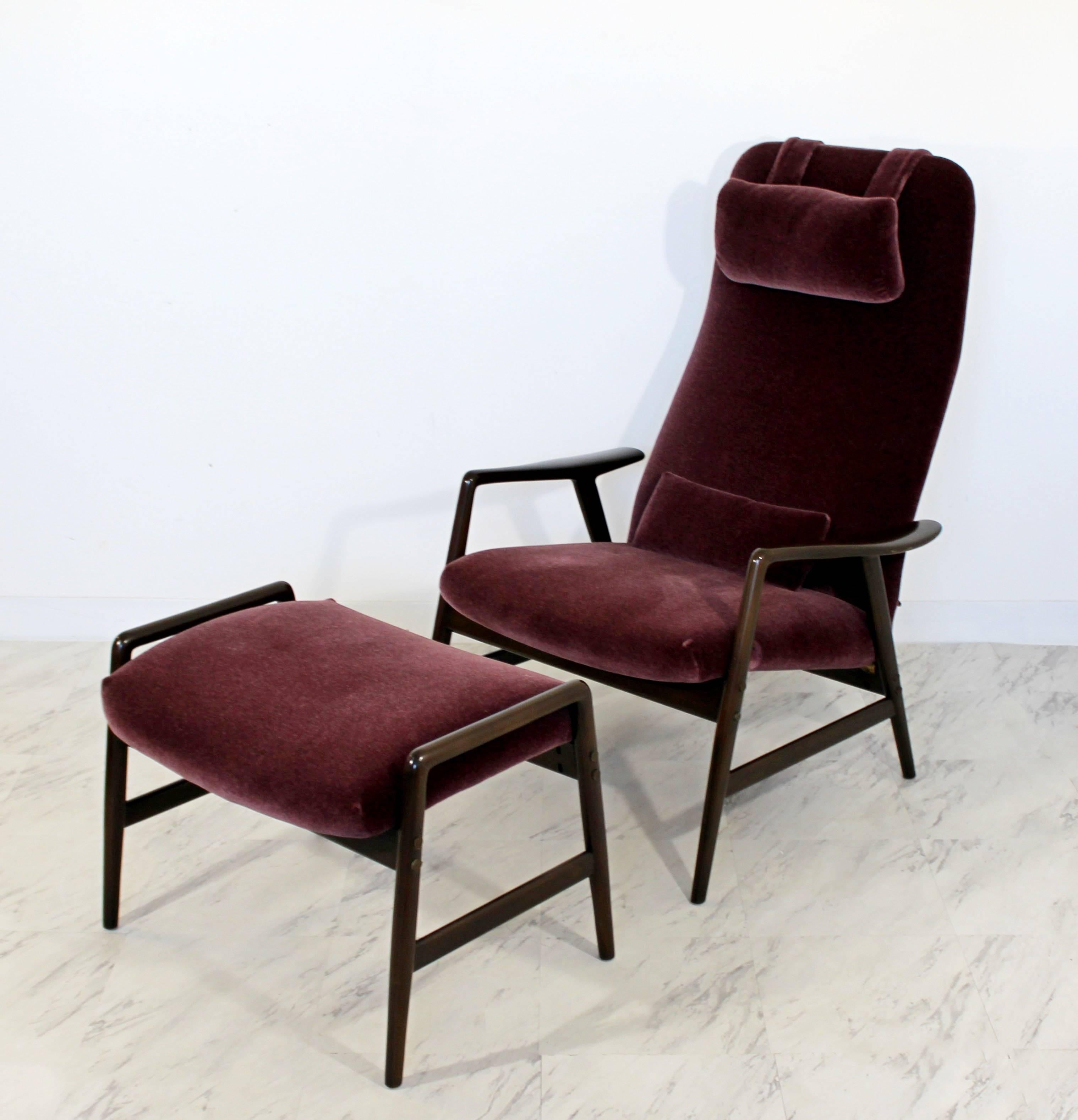 For your consideration is a magnificent, high back, reclining lounge chair and ottoman, professionally reupholstered in a deep purple velvet mohair made in Sweden by DUX, circa 1960s. In excellent condition. The dimensions of the chair are 29